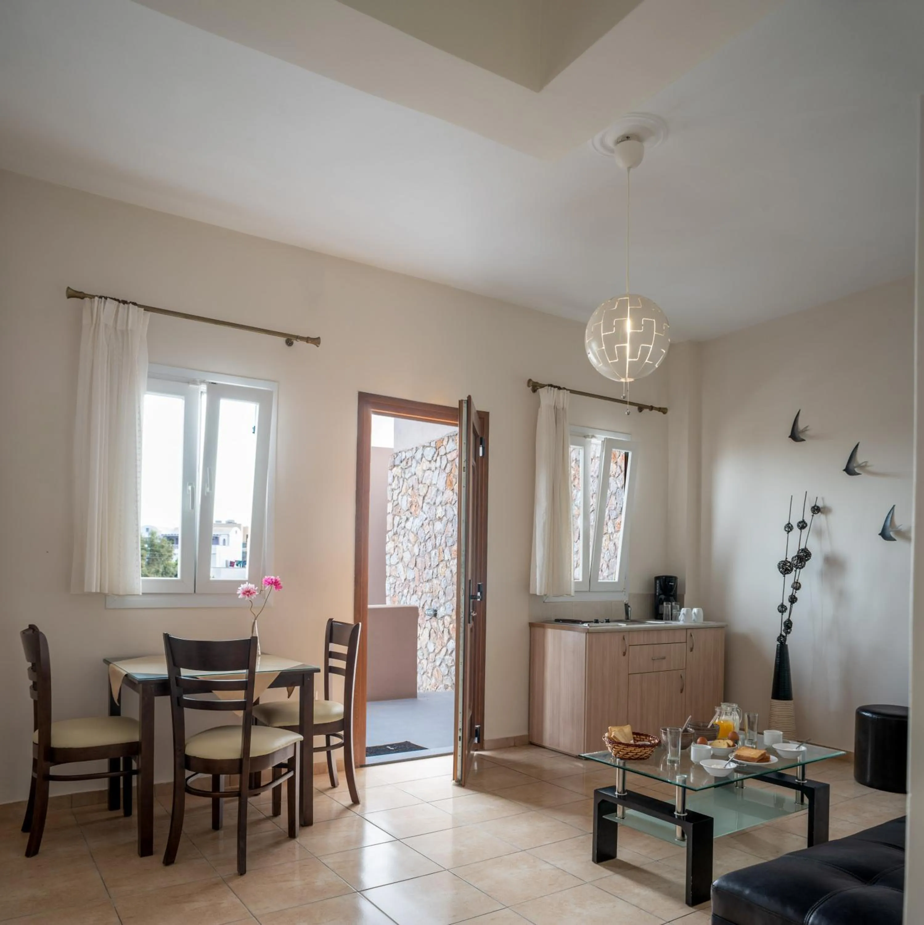 Kitchen or kitchenette in Moonlight Apartments & Suites