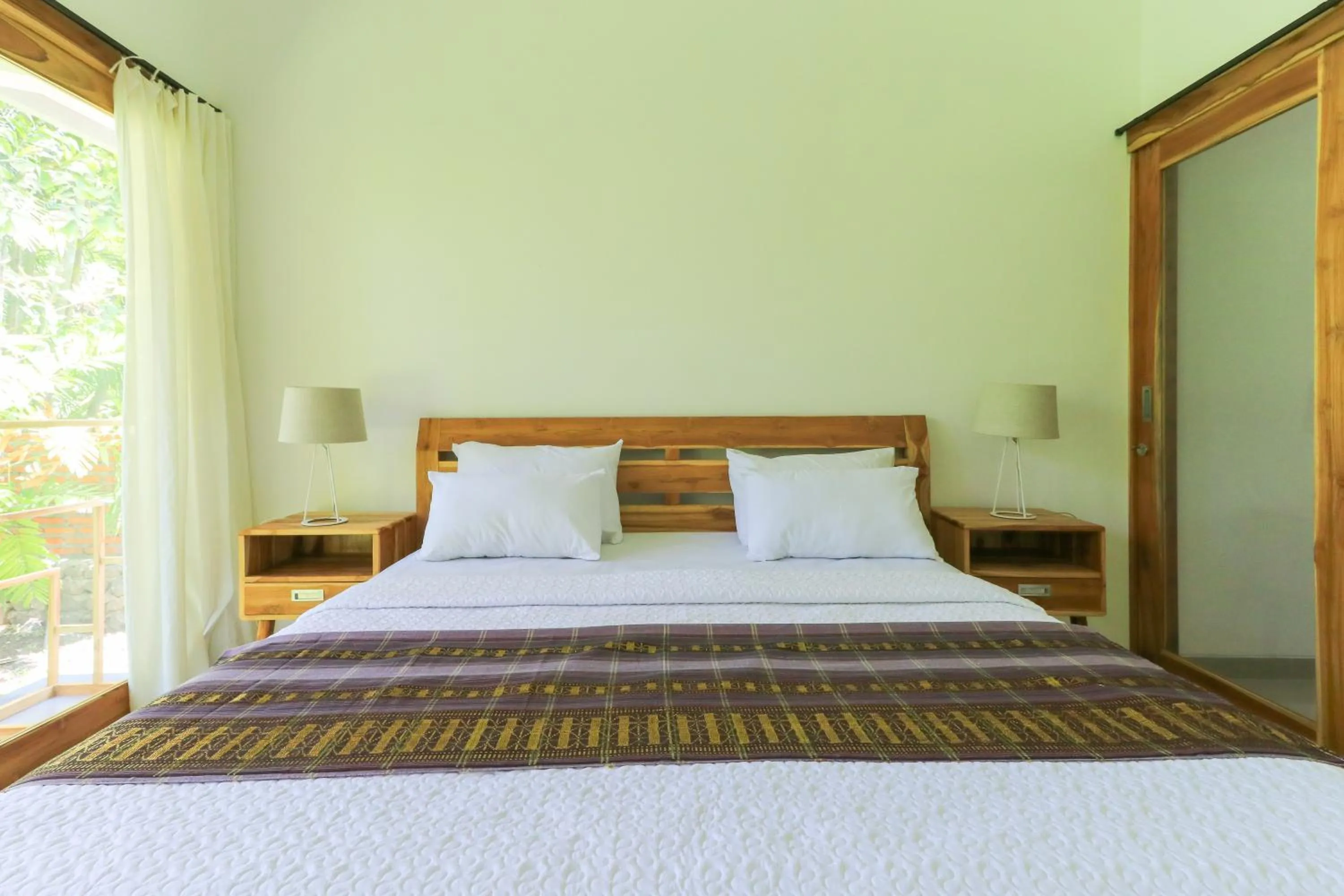 Bed in Palm Beach Villas Bali