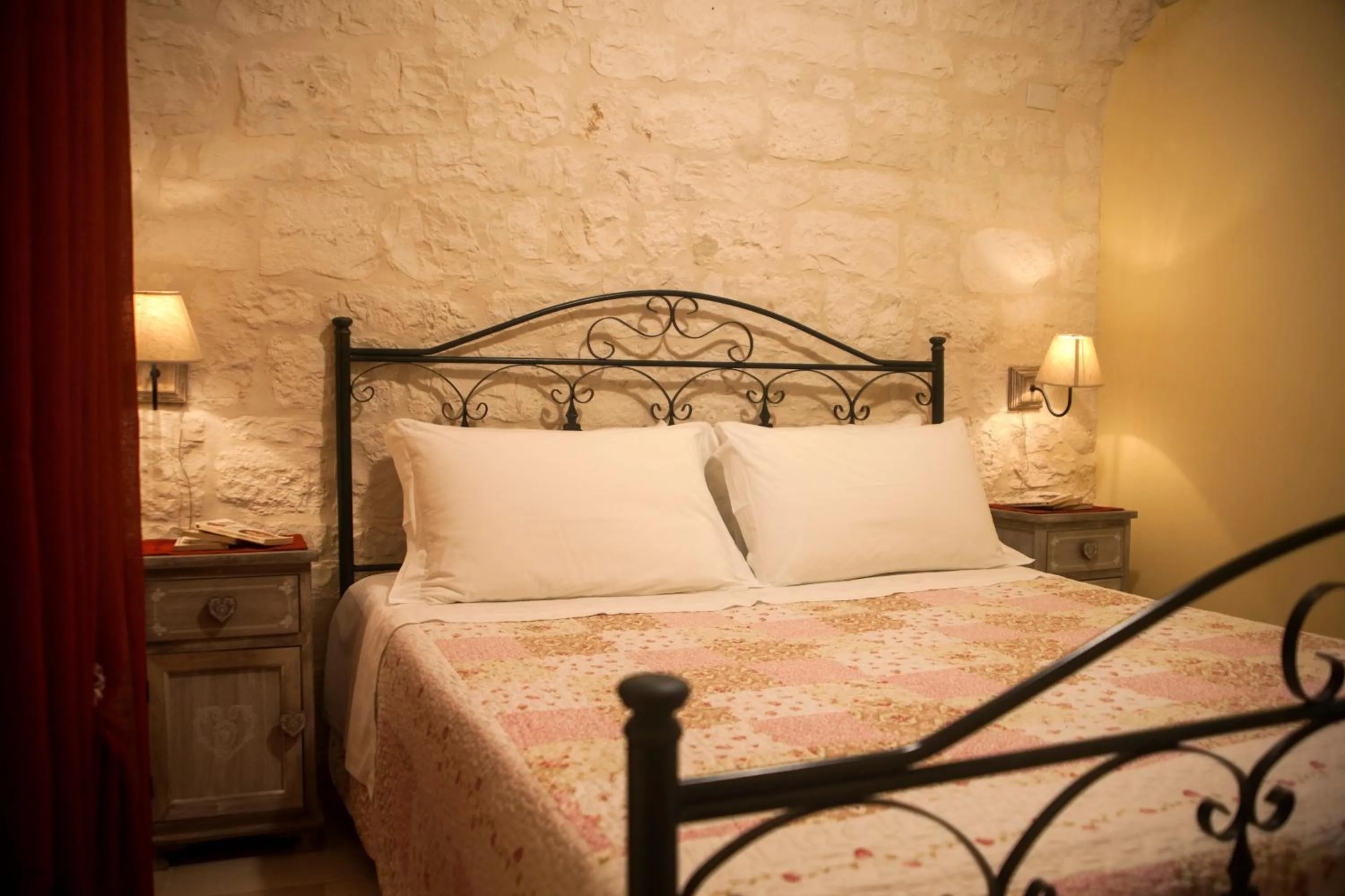Bed in Il Calàscione Apulian Villas