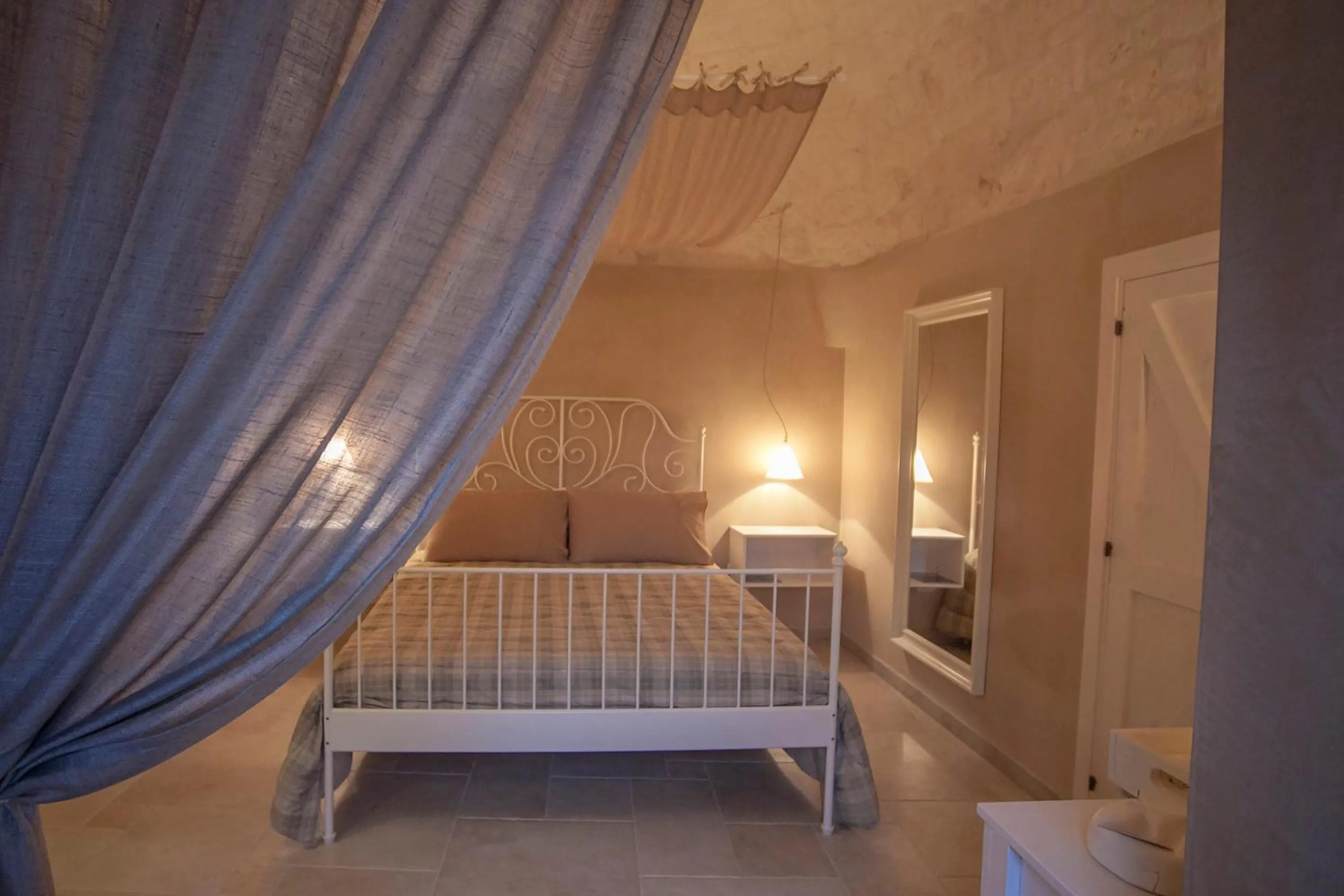 Photo of the whole room, Bed in Il Calàscione Apulian Villas
