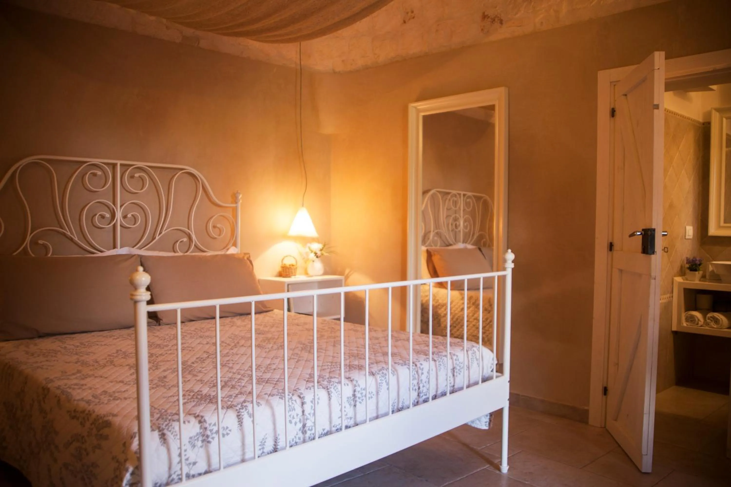 Bed in Il Calàscione Apulian Villas