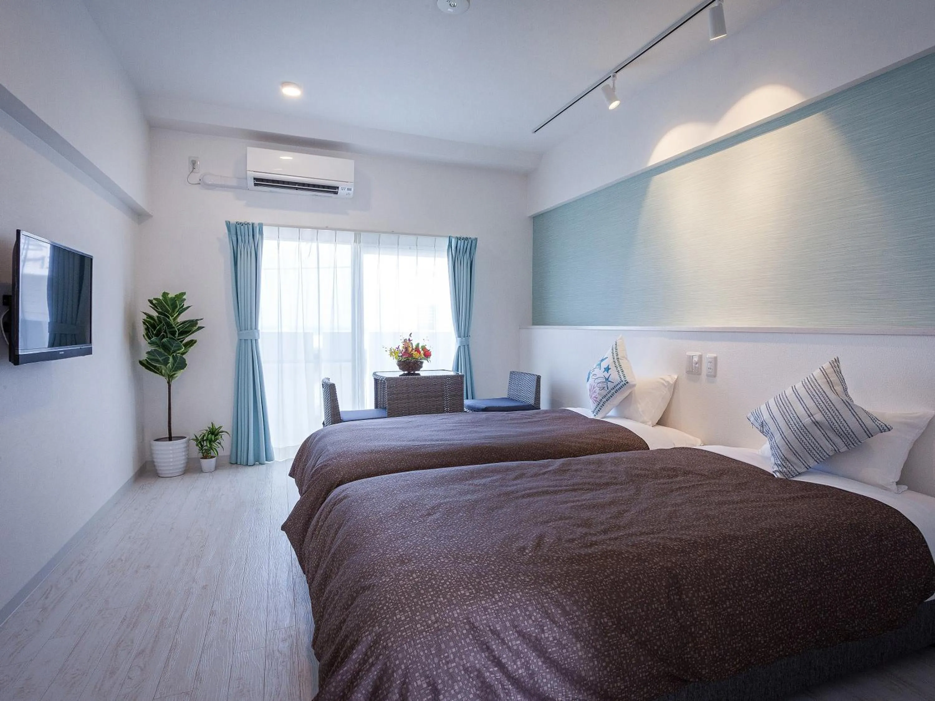 Bed in Yonabaru Hotel SUNRIZE OCEAN