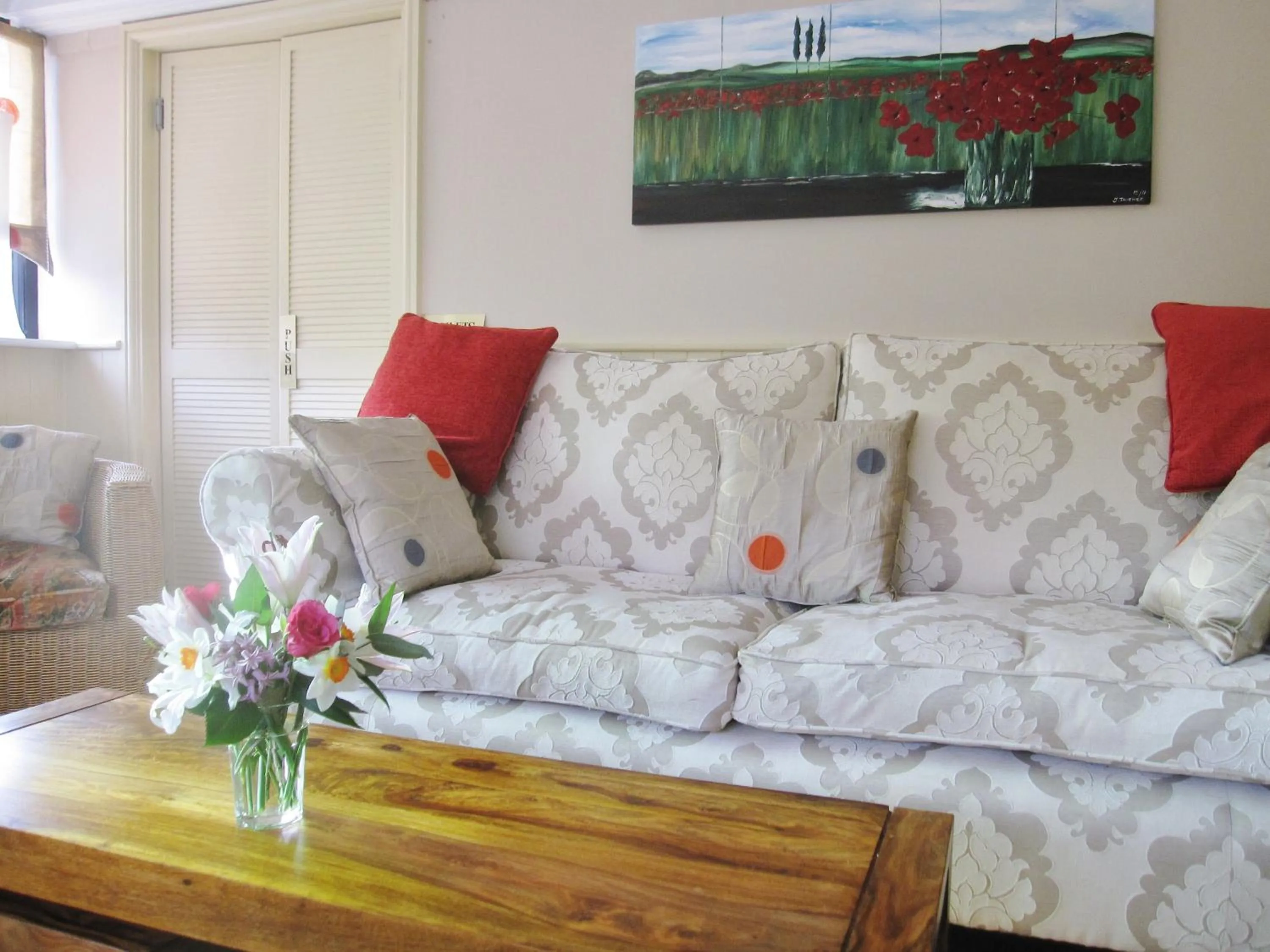 Communal lounge/ TV room in Greenbanks Hotel Norfolk