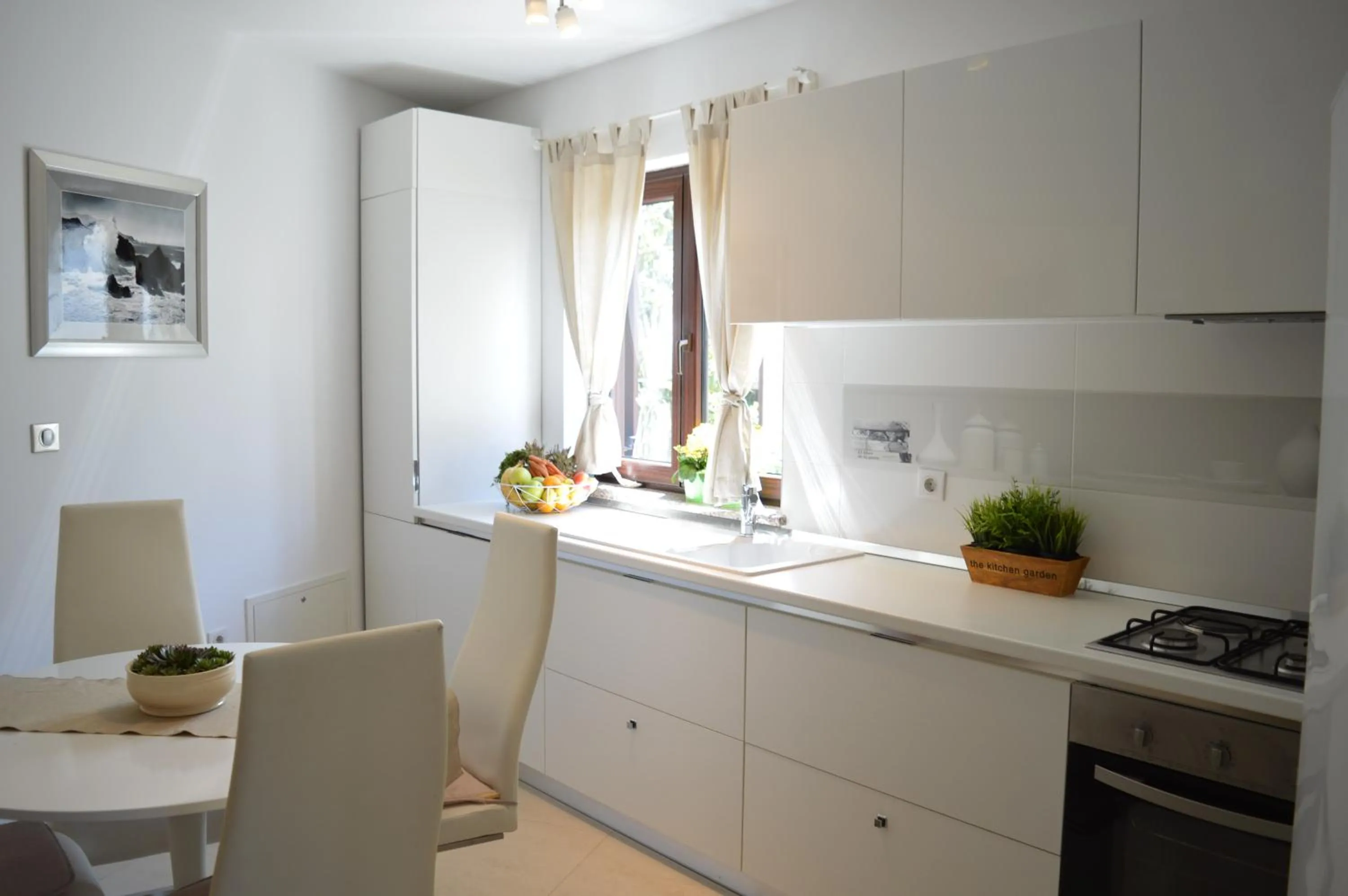 Kitchen or kitchenette in Apartments Villa Alba