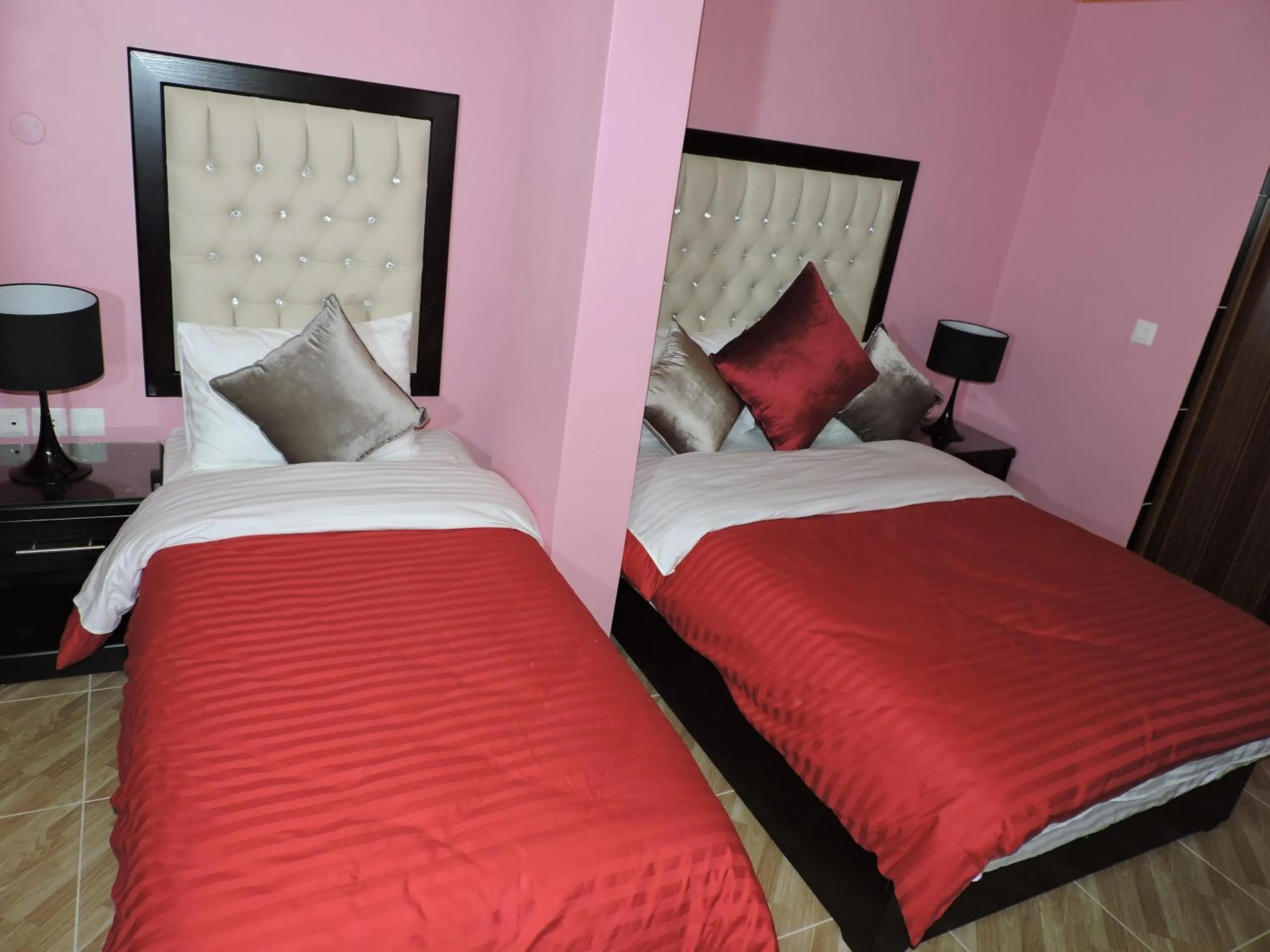 Bed in Valentine Inn Luxury