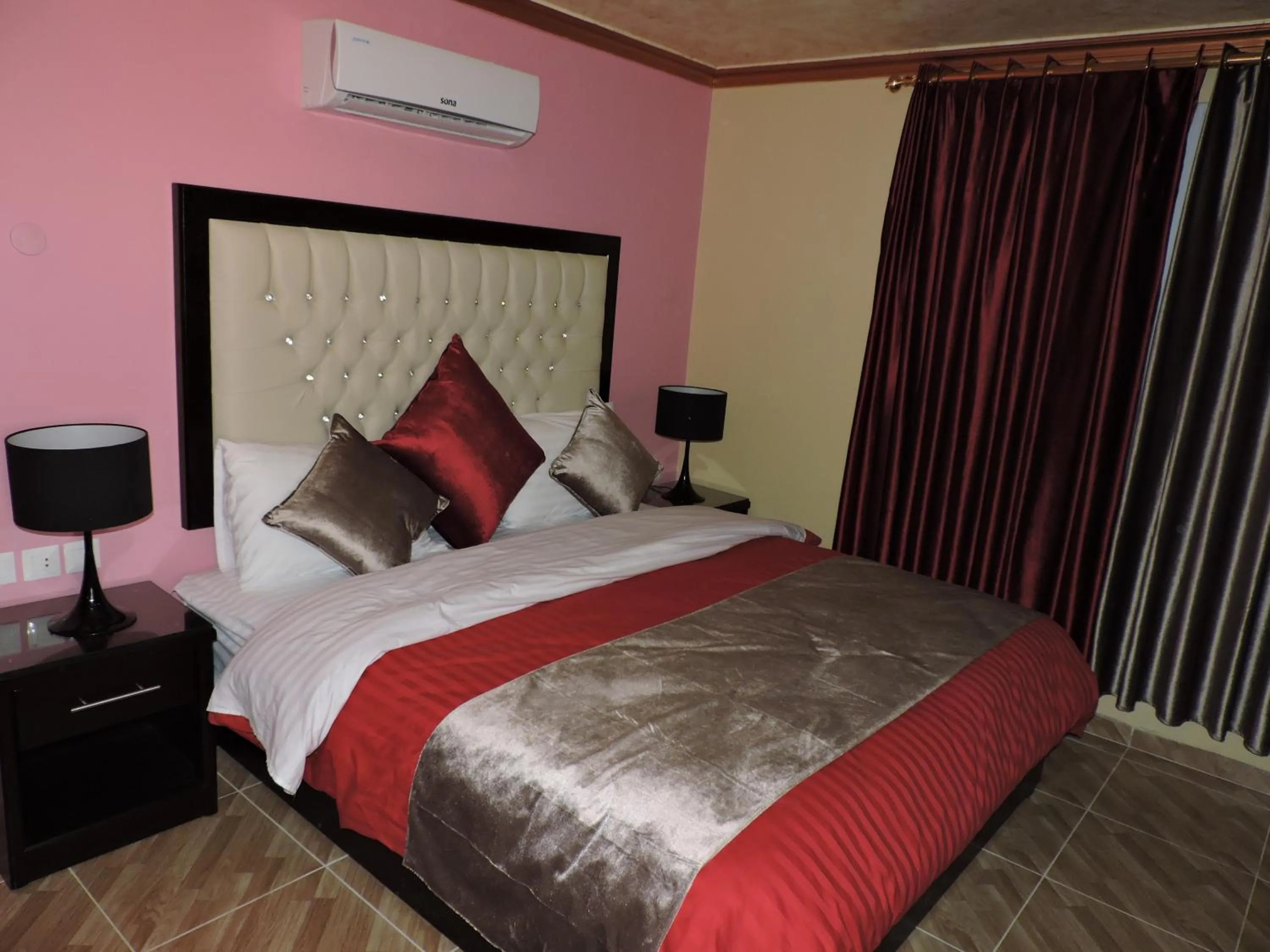 Bed in Valentine Inn Luxury