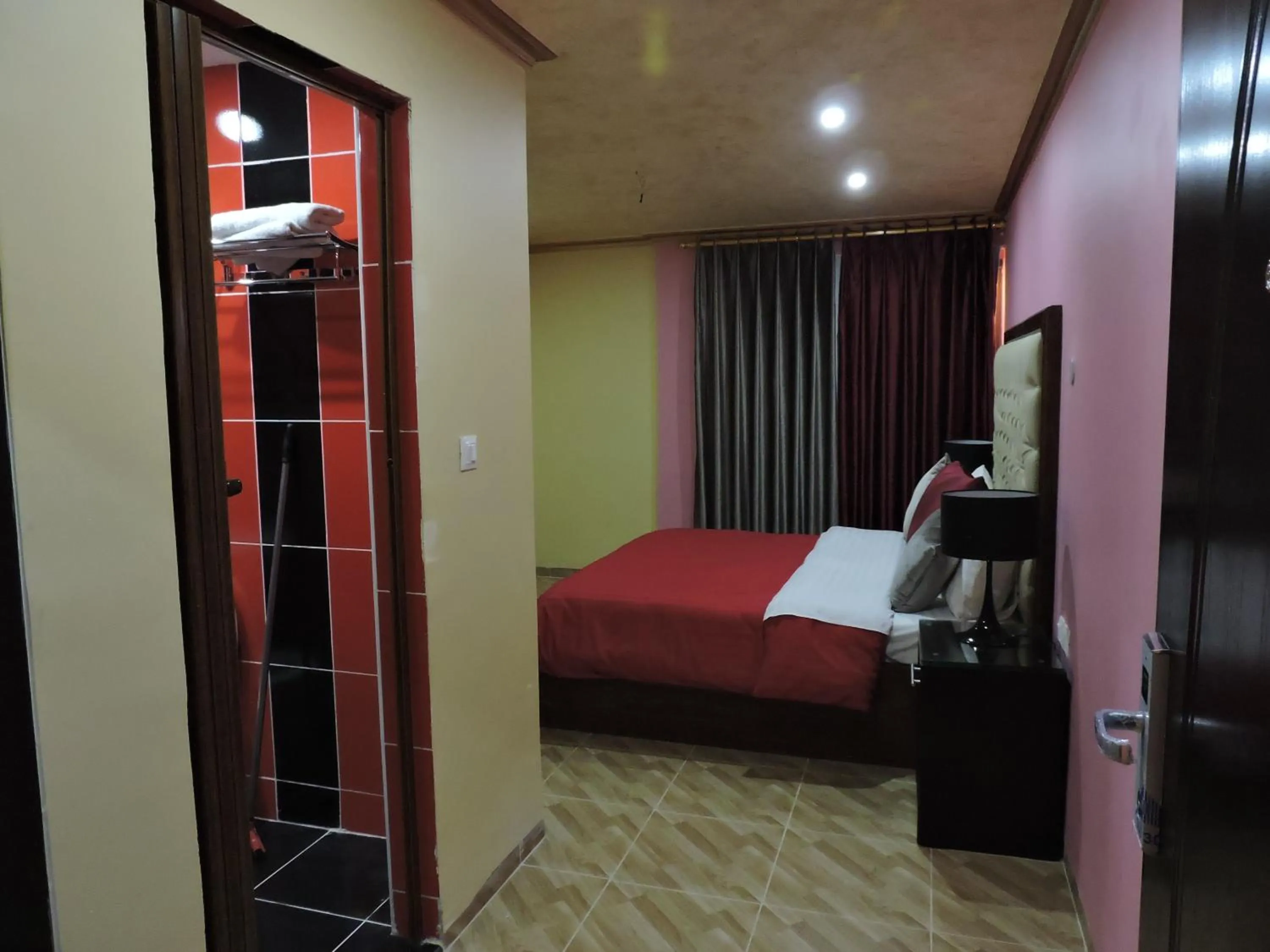 Bed in Valentine Inn Luxury