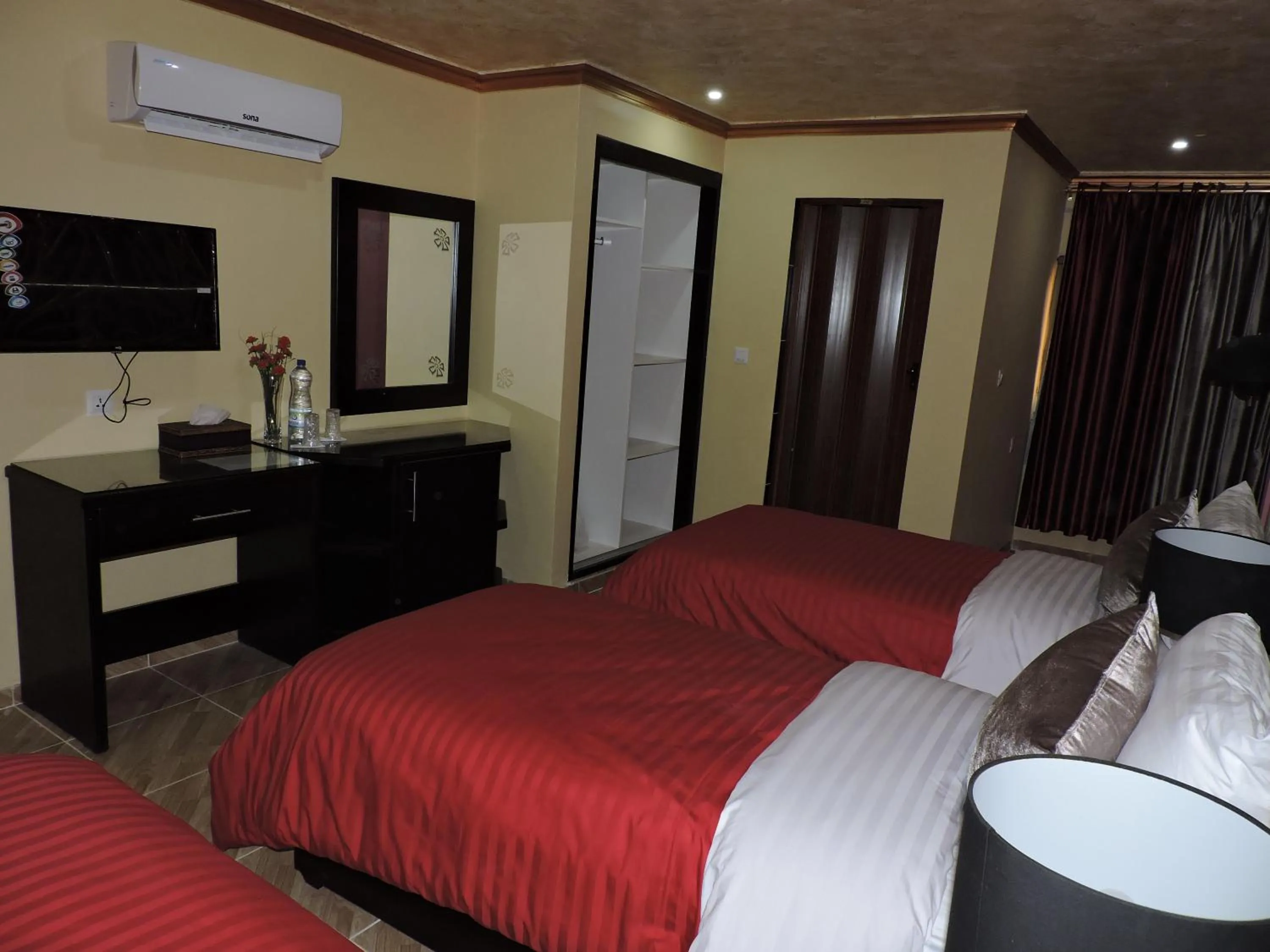 Bed in Valentine Inn Luxury