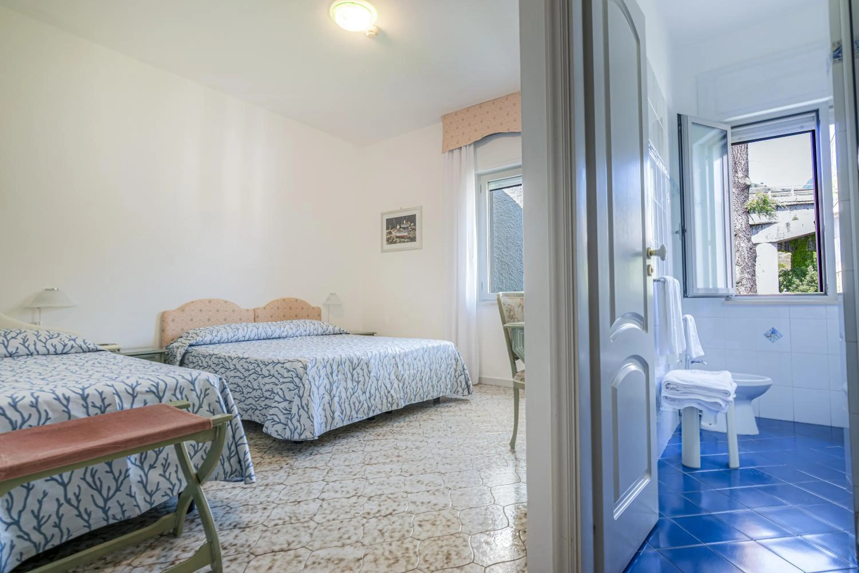 Bed in Hotel Poseidon