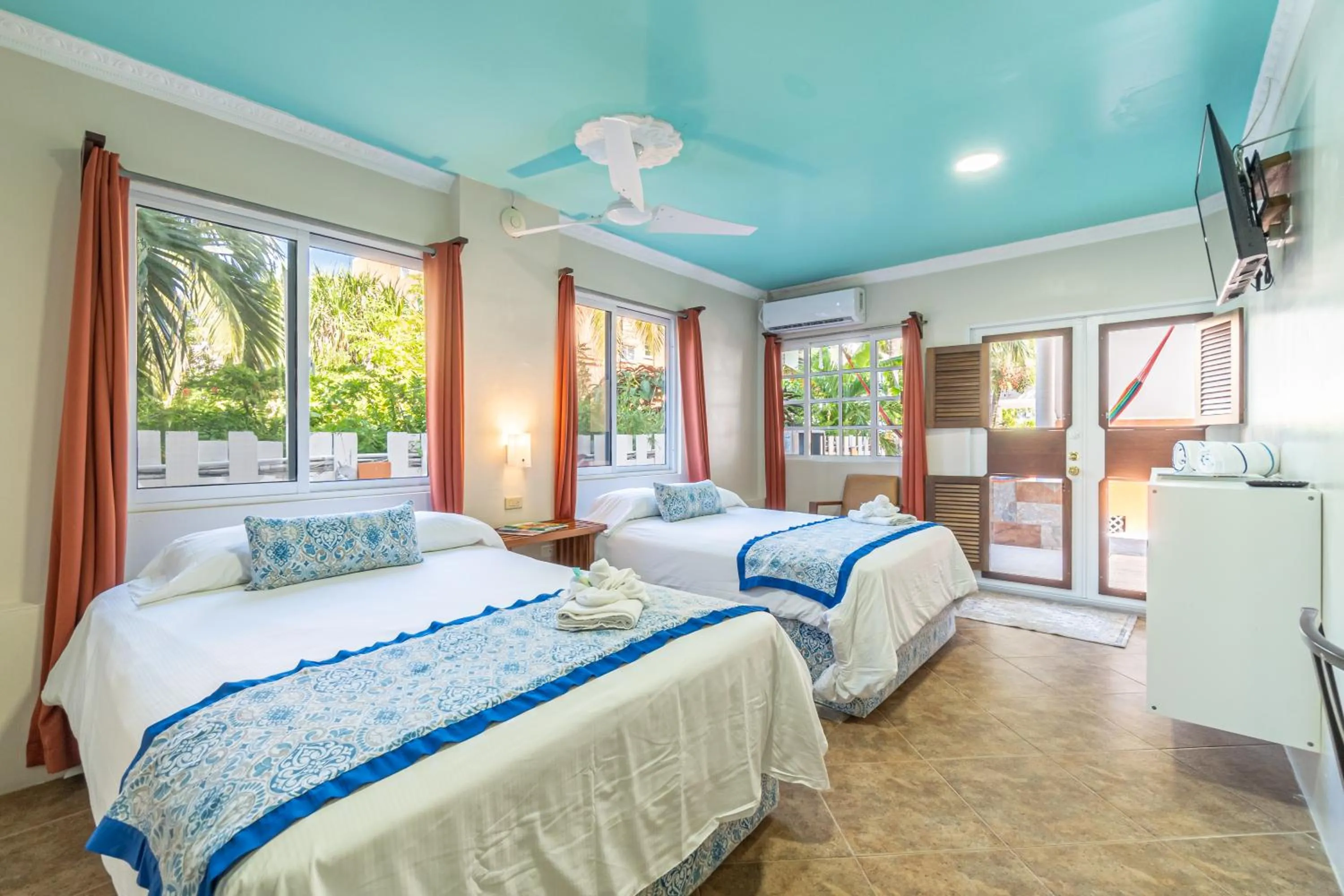 Bed in Island Magic Beach Resort