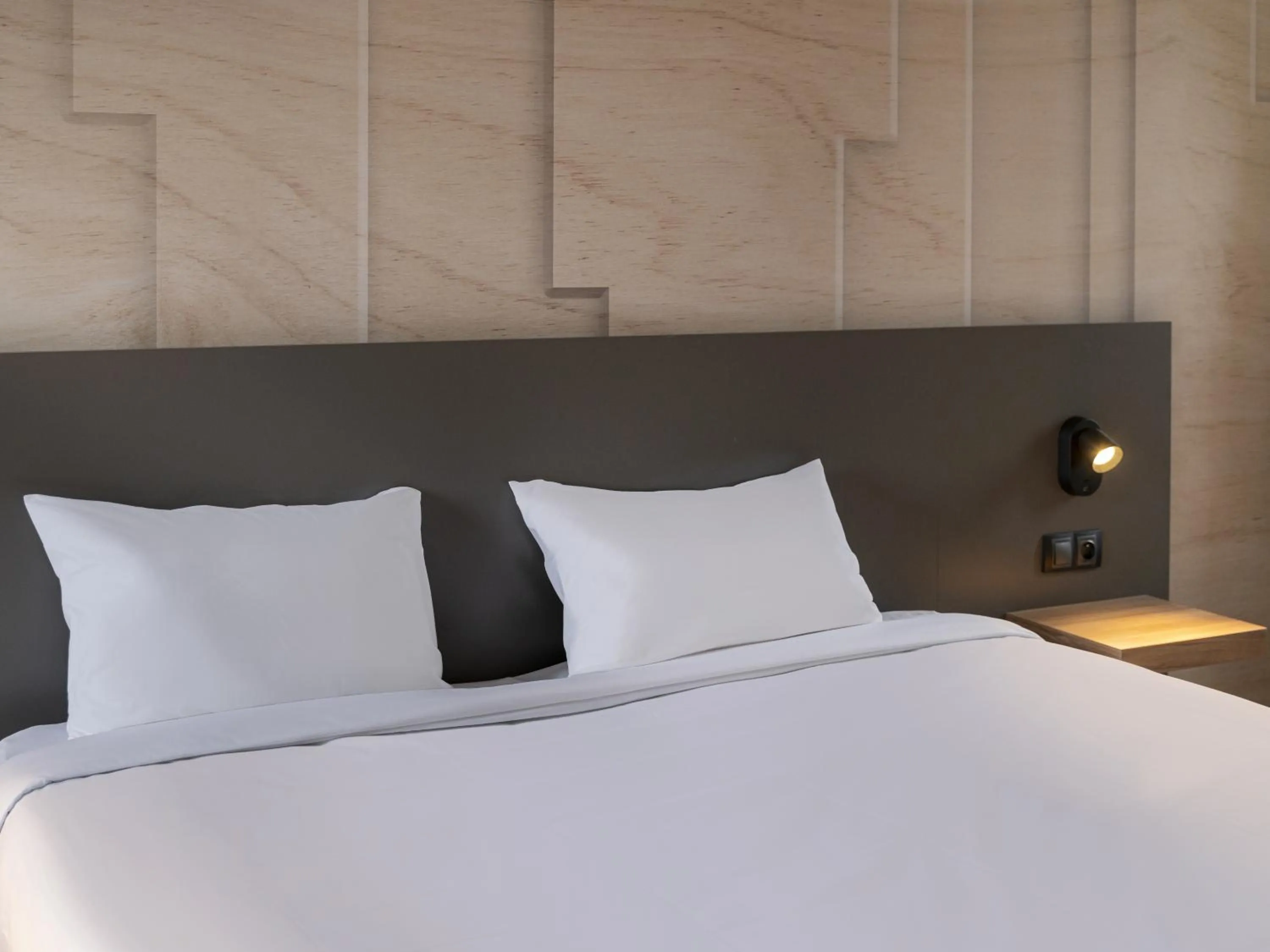 Bed in B&B HOTEL Lorient Ploemeur