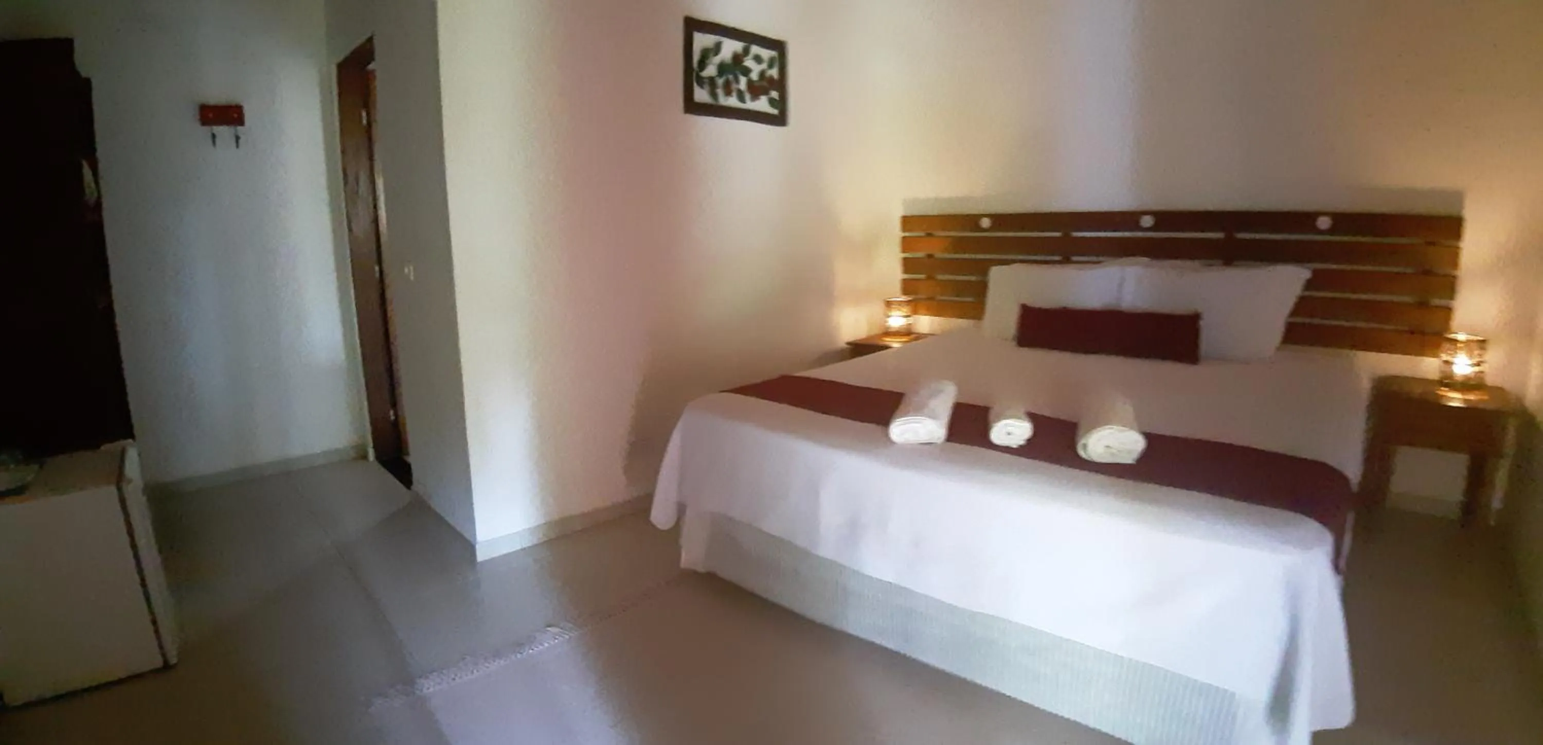 Bed in Pousada Canoa Caiçara Ilhabela