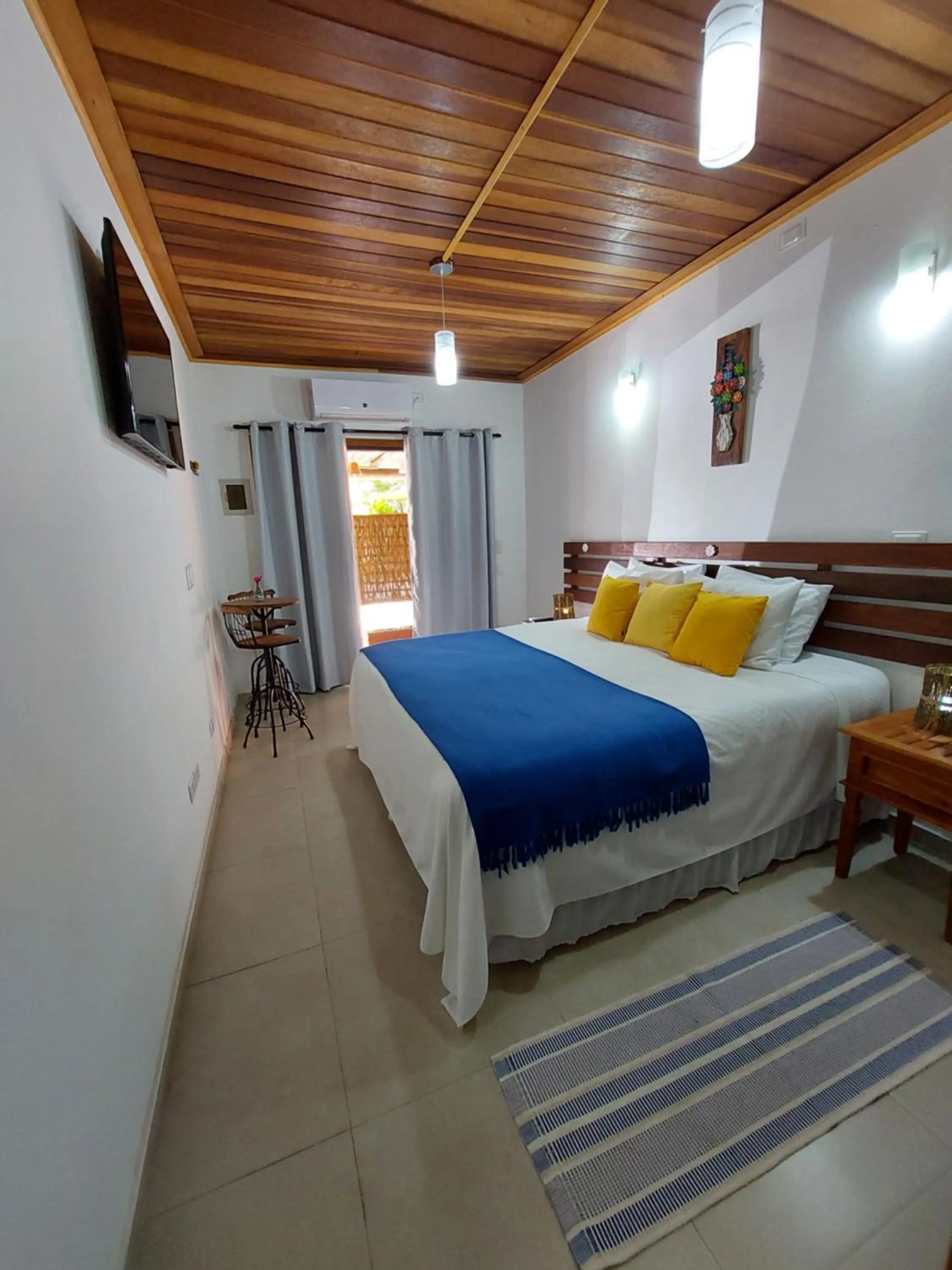 Bed in Pousada Canoa Caiçara Ilhabela