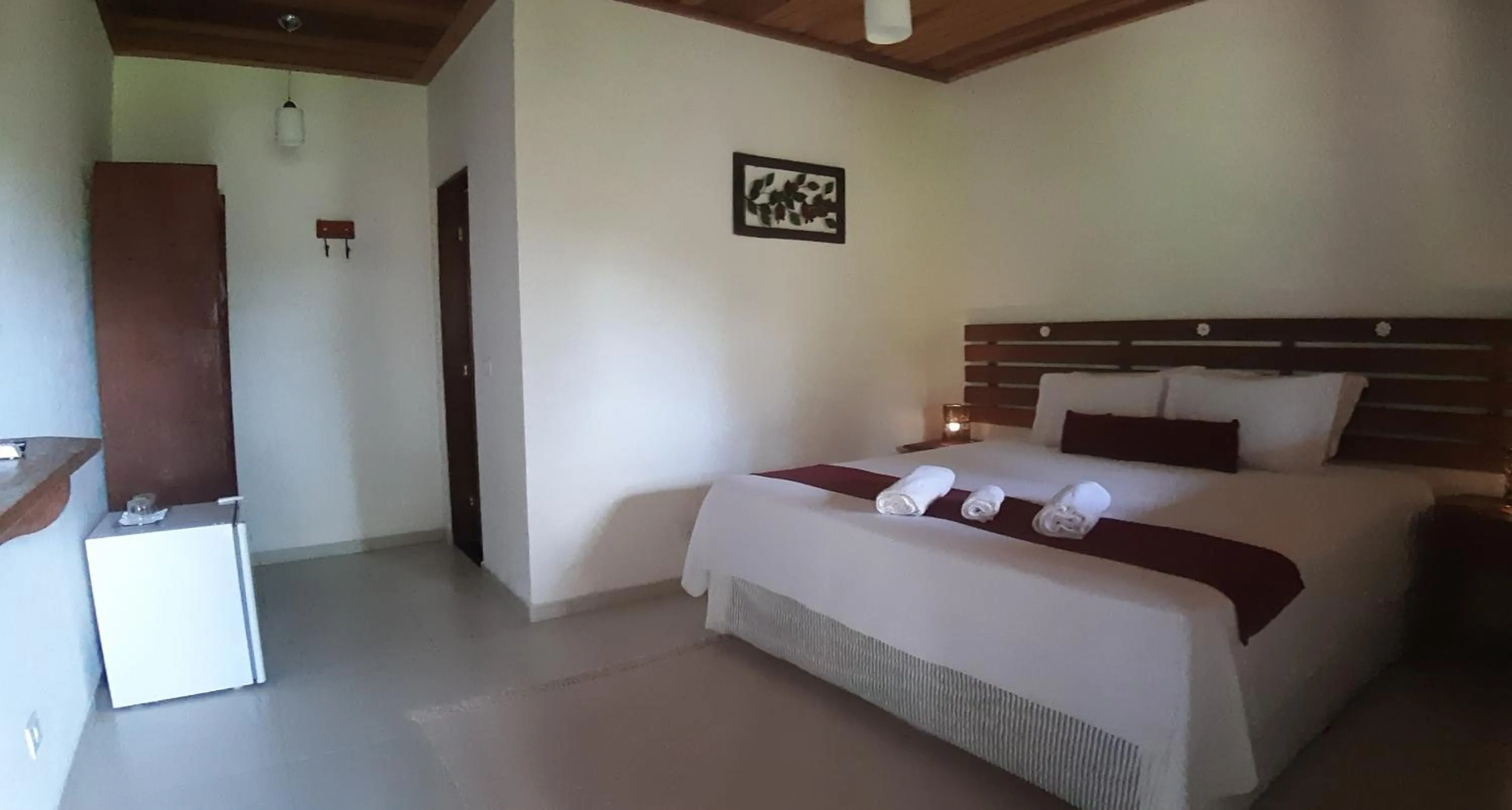 Bed in Pousada Canoa Caiçara Ilhabela