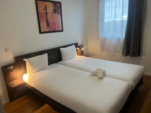 Bed in Aparthotel Adagio Access Paris Porte De Charenton