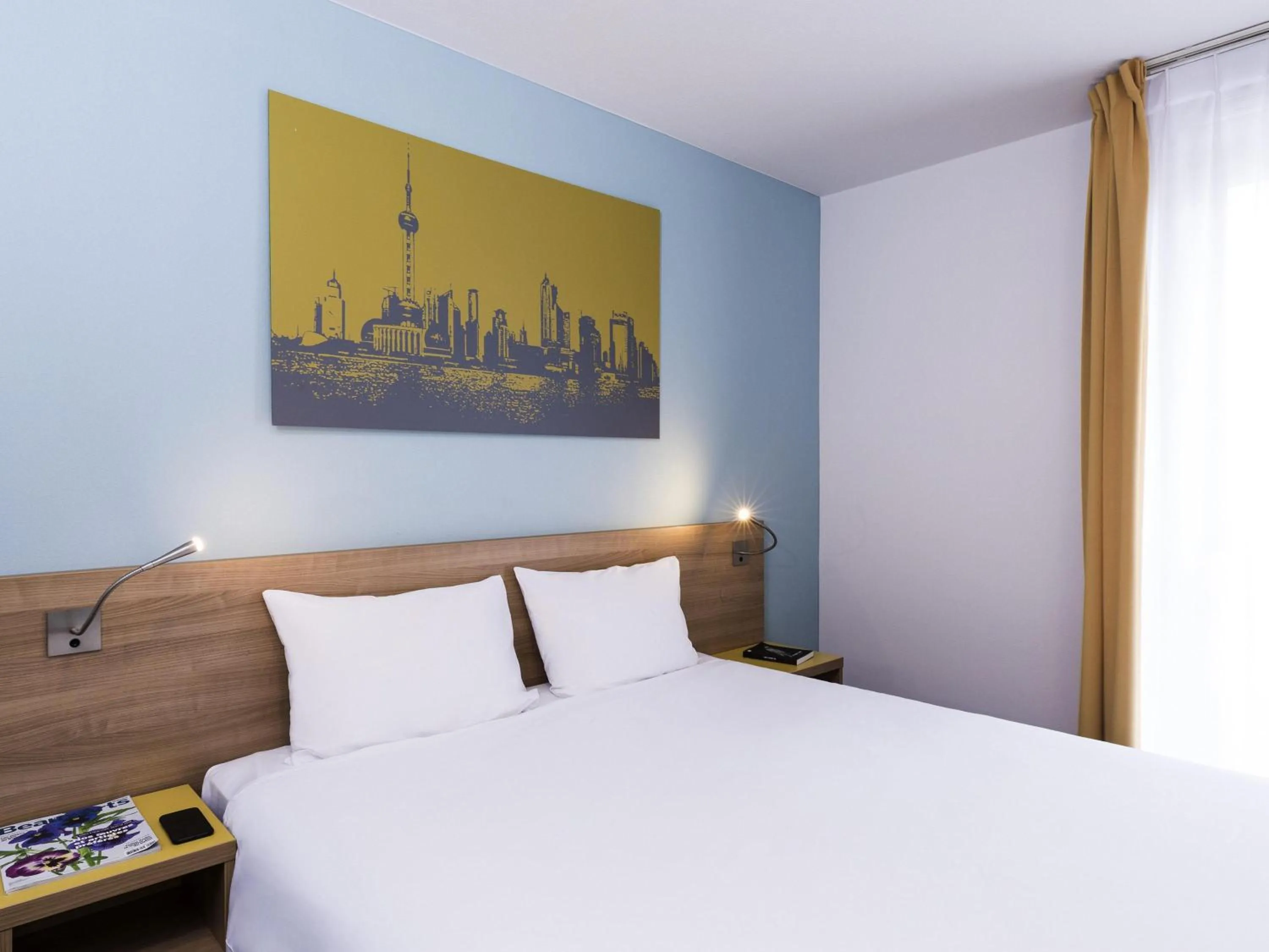 Bedroom, Bed in Aparthotel Adagio Access Paris Clamart