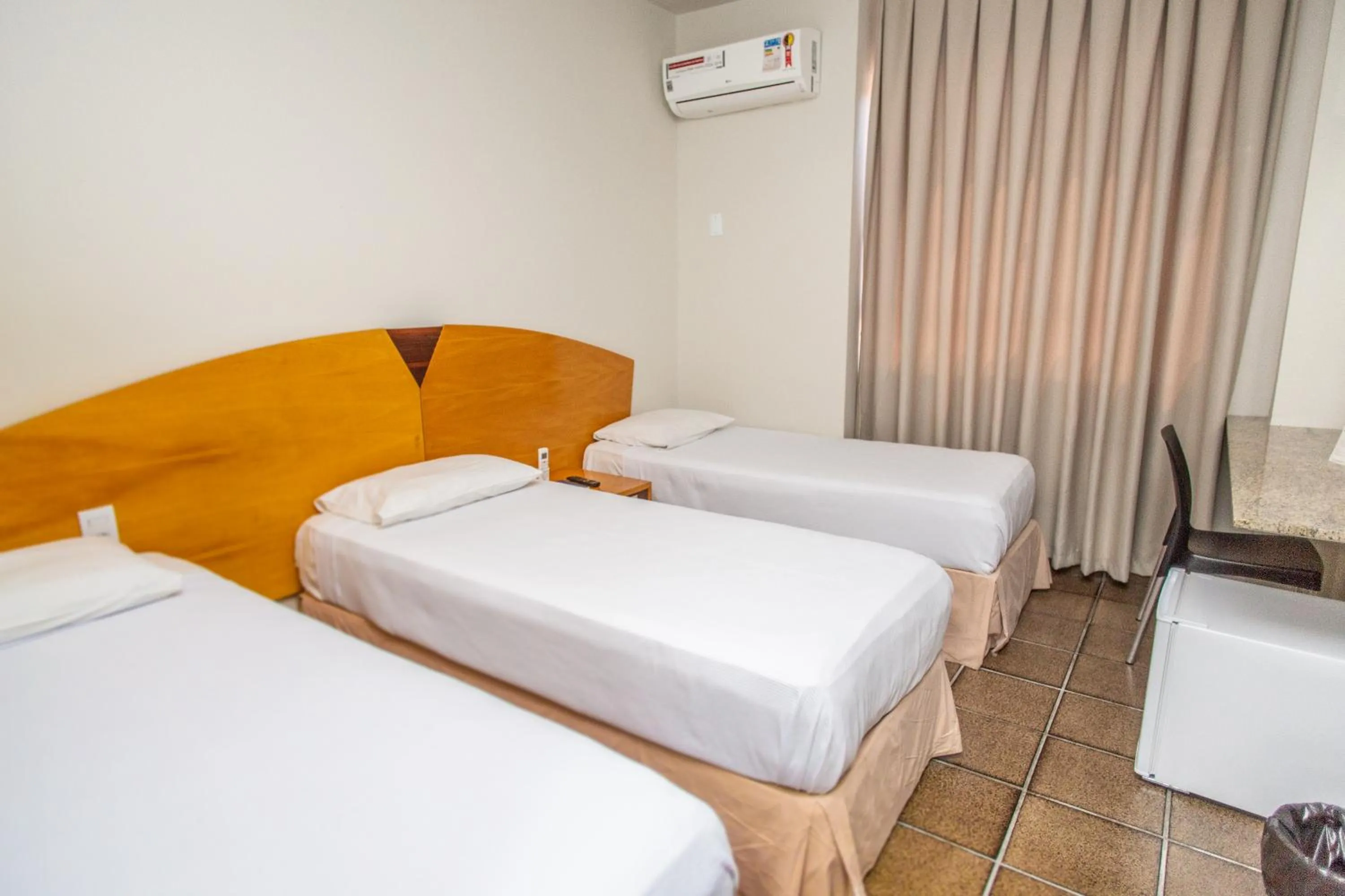 Bed in Panorama Convention Hotel