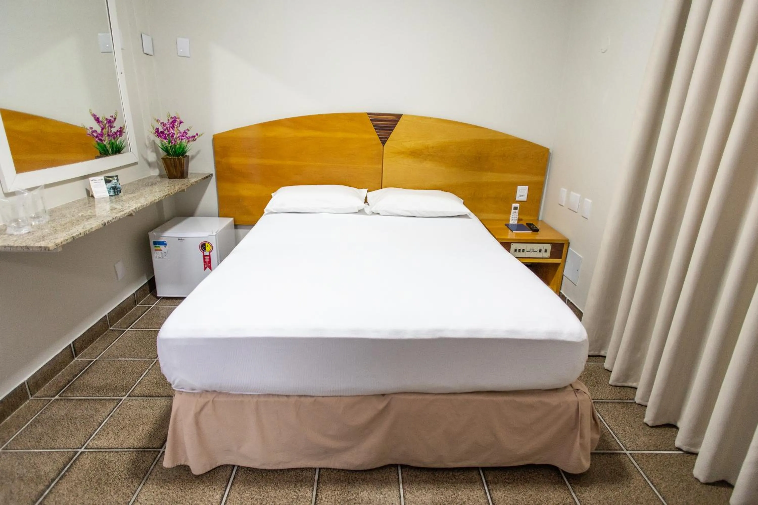 Bed in Panorama Convention Hotel