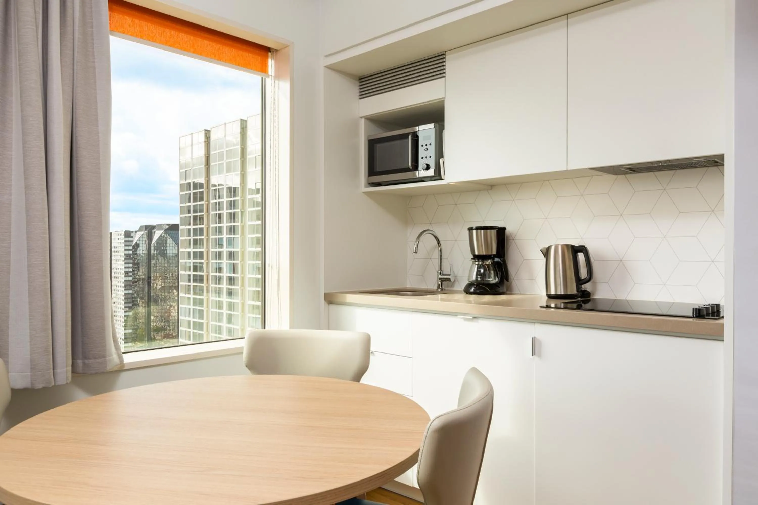 Kitchen or kitchenette in Aparthotel Adagio Paris Centre Tour Eiffel