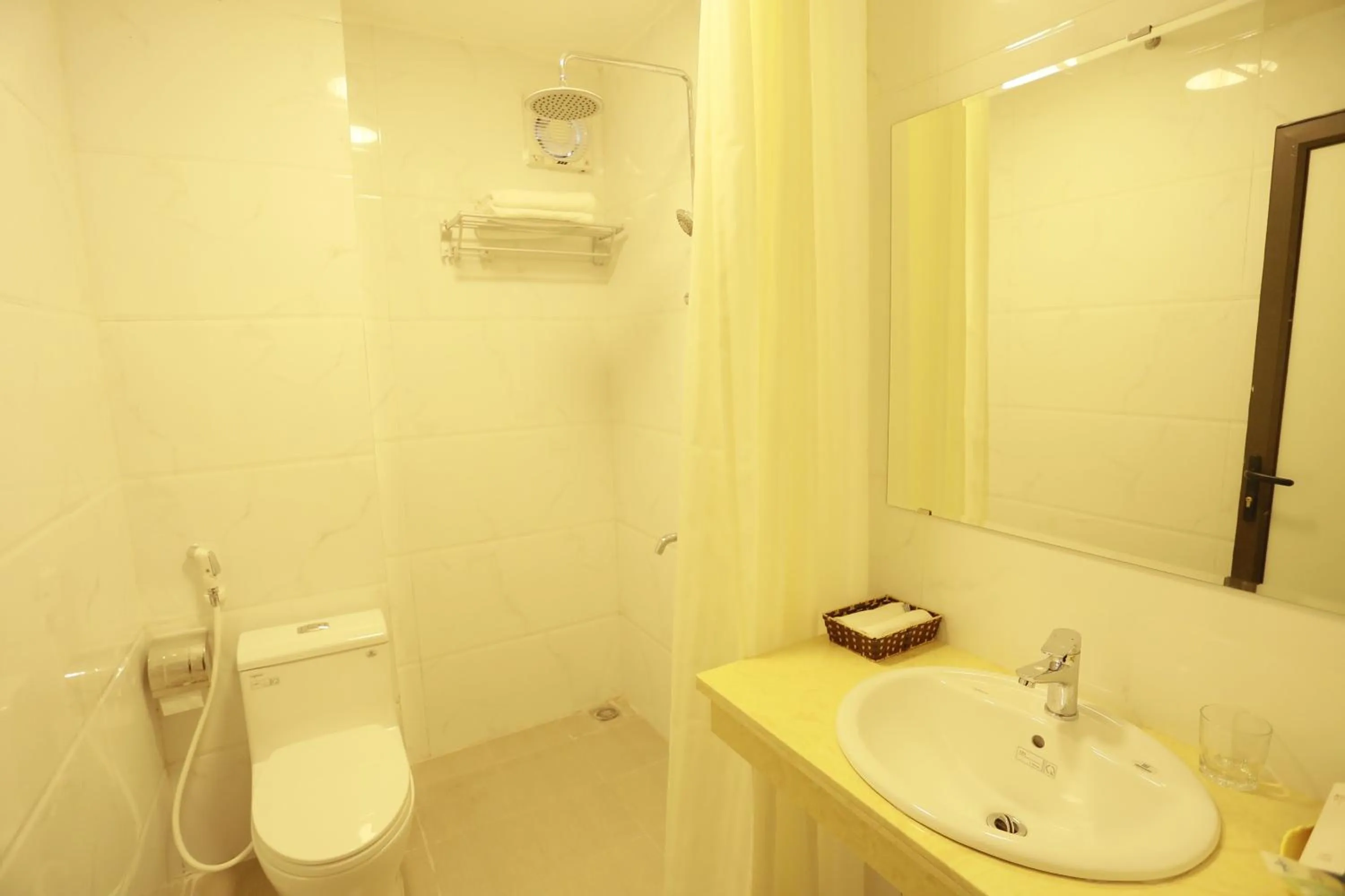 Toilet in Anova 2 Hotel