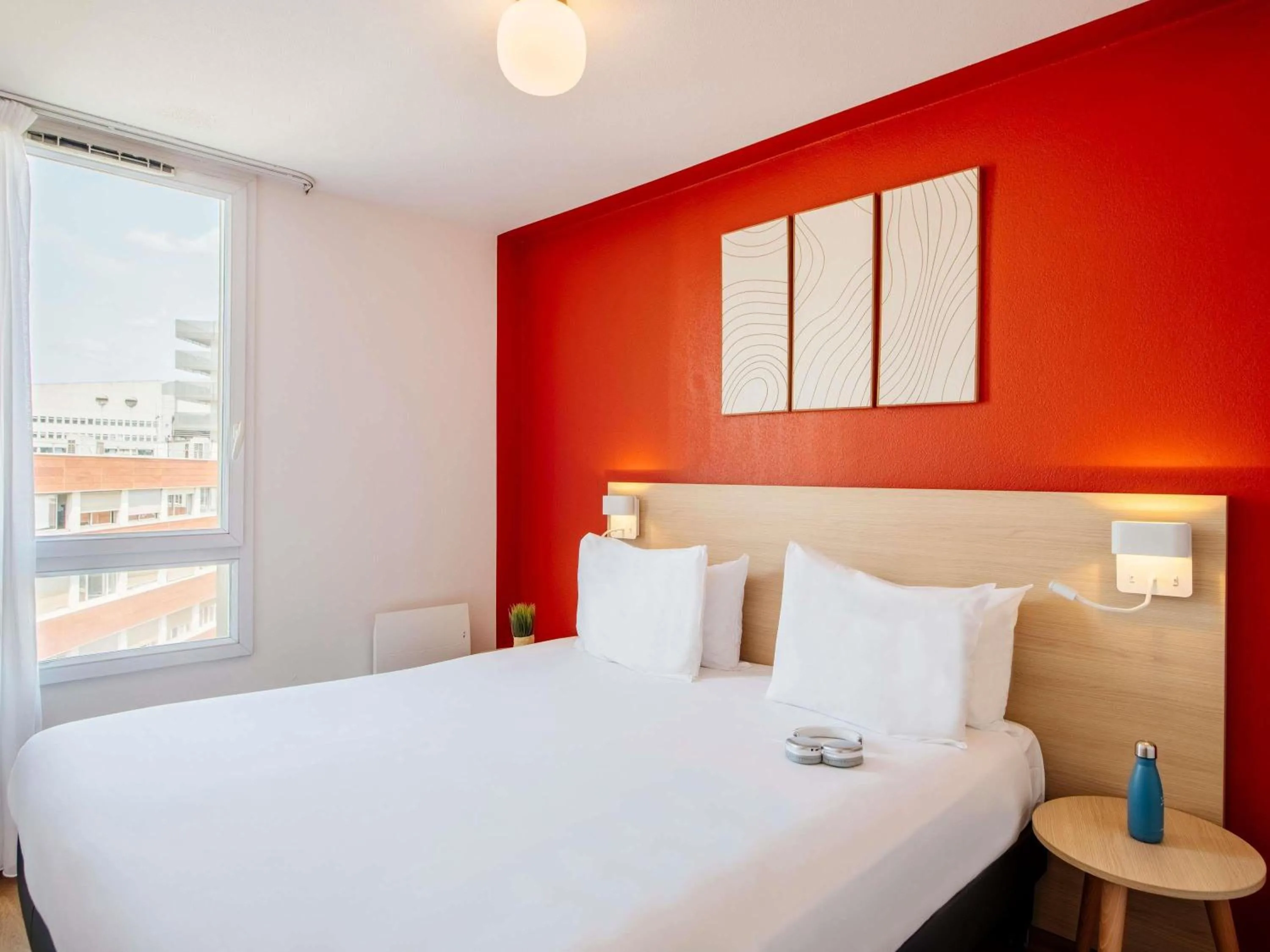 Bedroom, Bed in Aparthotel Adagio Access Paris Saint-Denis Pleyel
