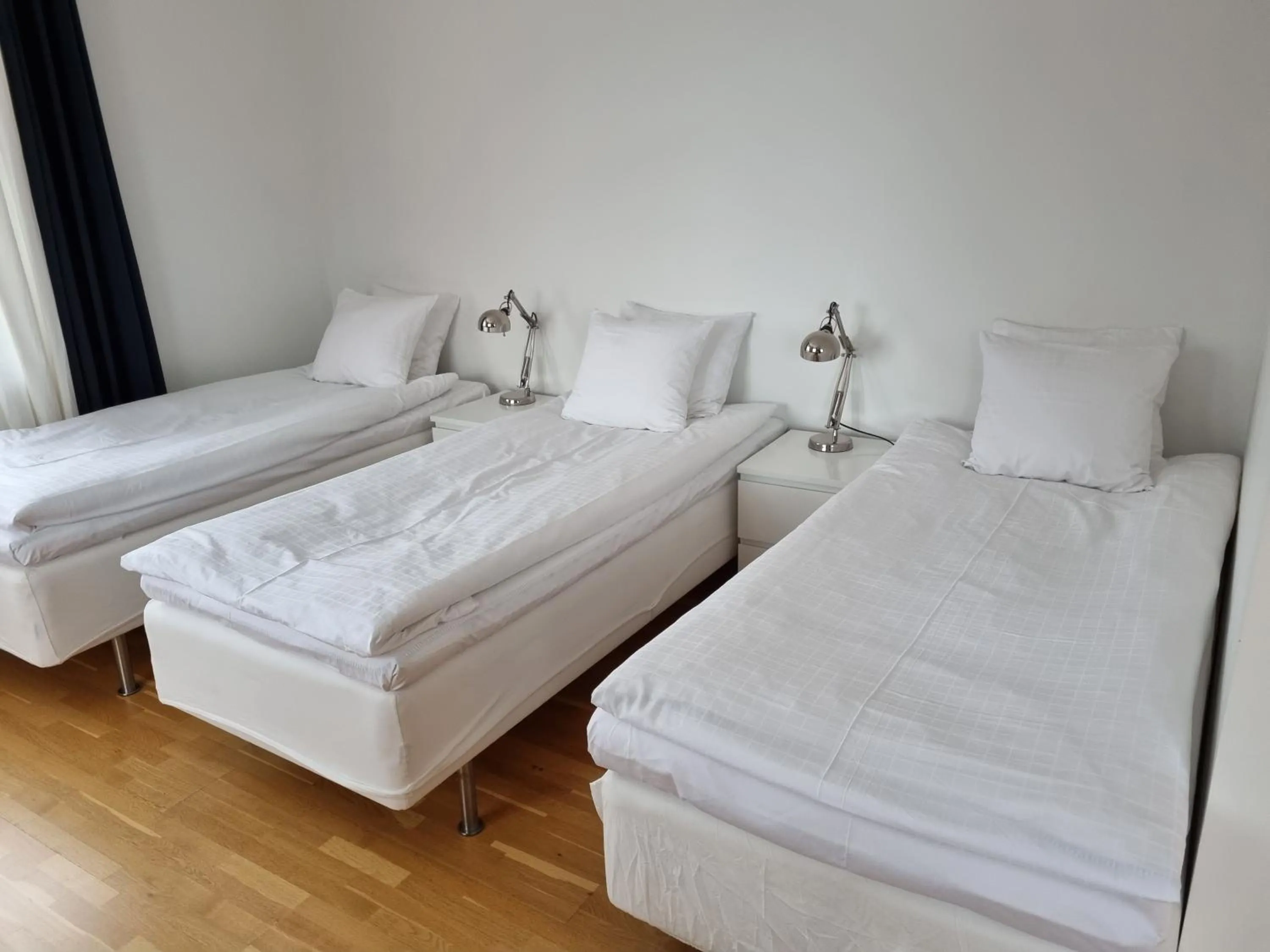 Bed in Gamla Järnhandeln - Norrskedika Hotell