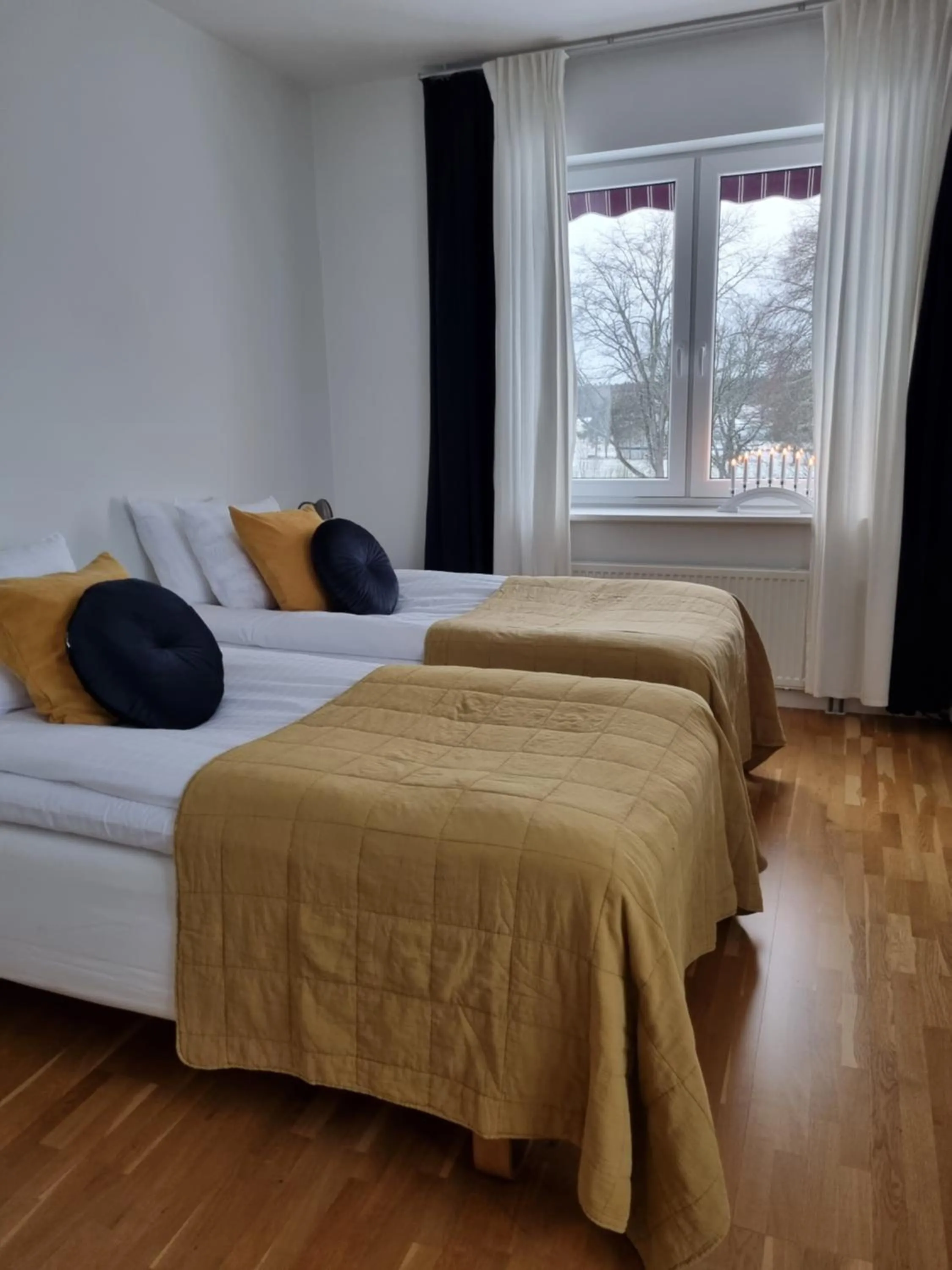 Bed in Gamla Järnhandeln - Norrskedika Hotell