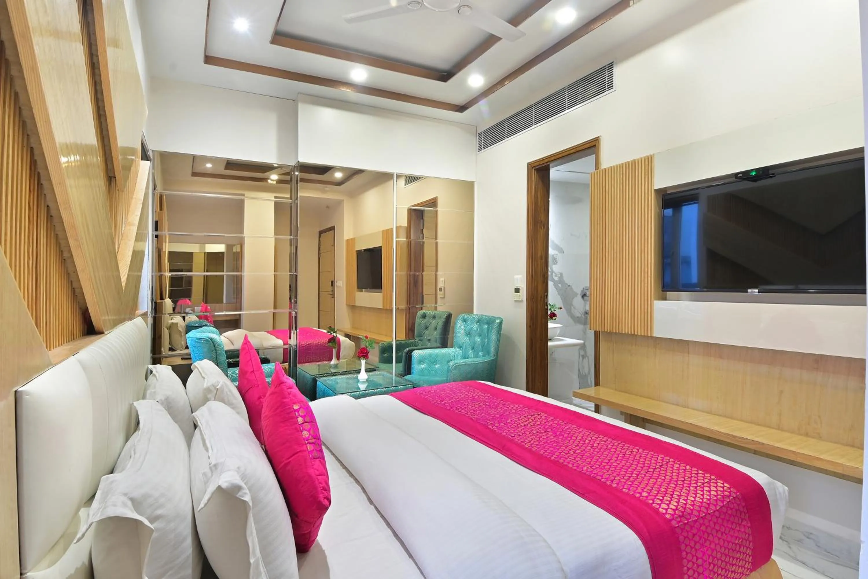 Seating area, Bed in Hotel Aman International -All Staff Vaccinated