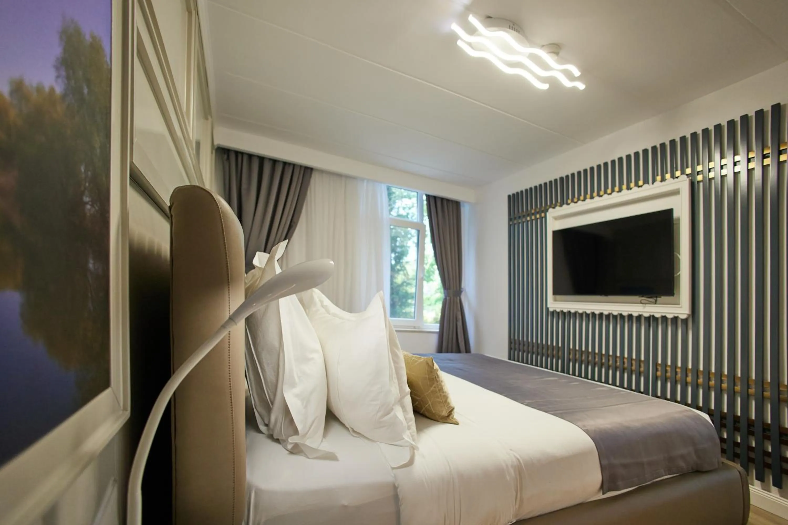 Bed in Lebada Luxury Resort & Spa