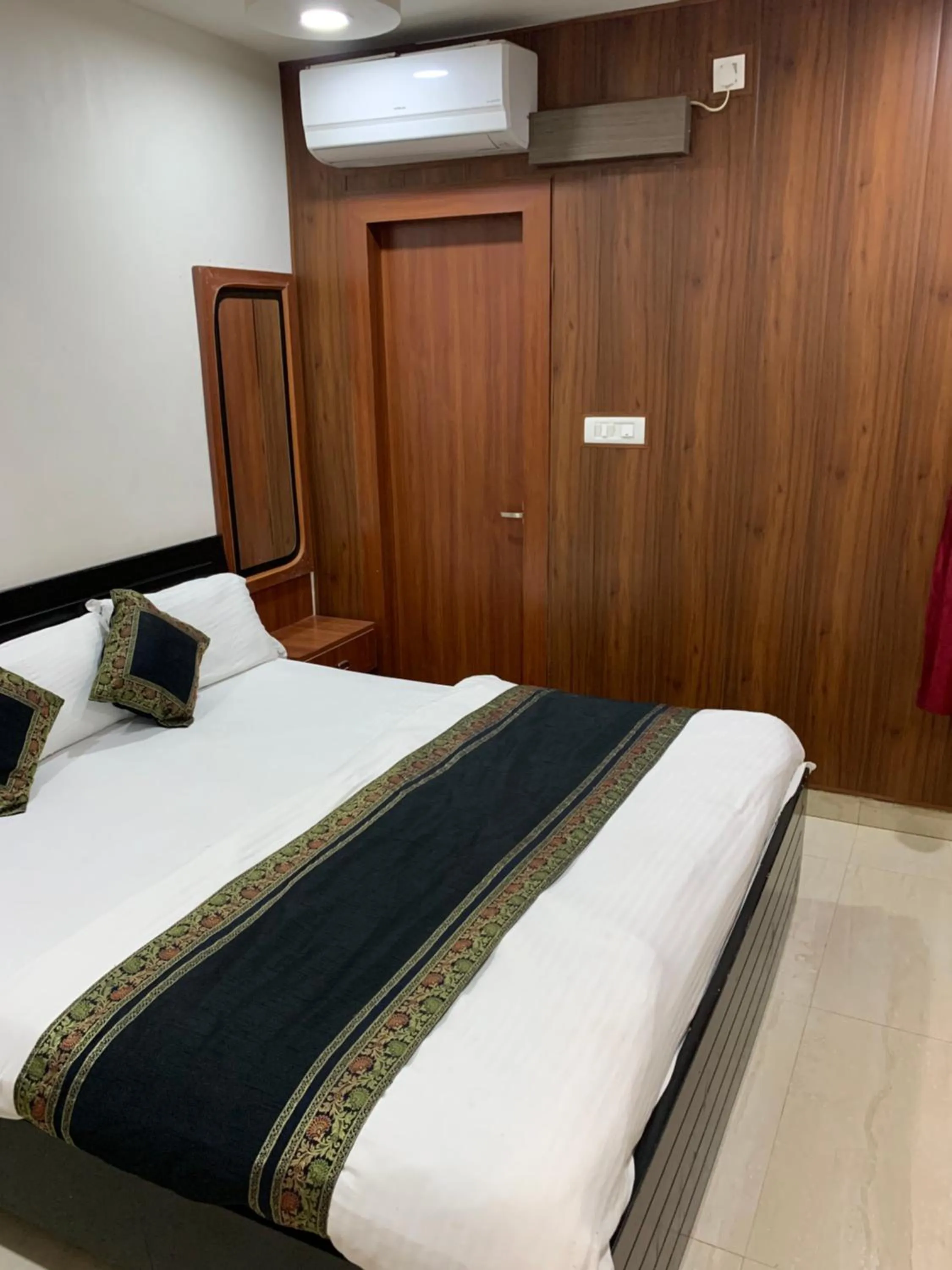 Bed in Hotel Ashoka Ganages