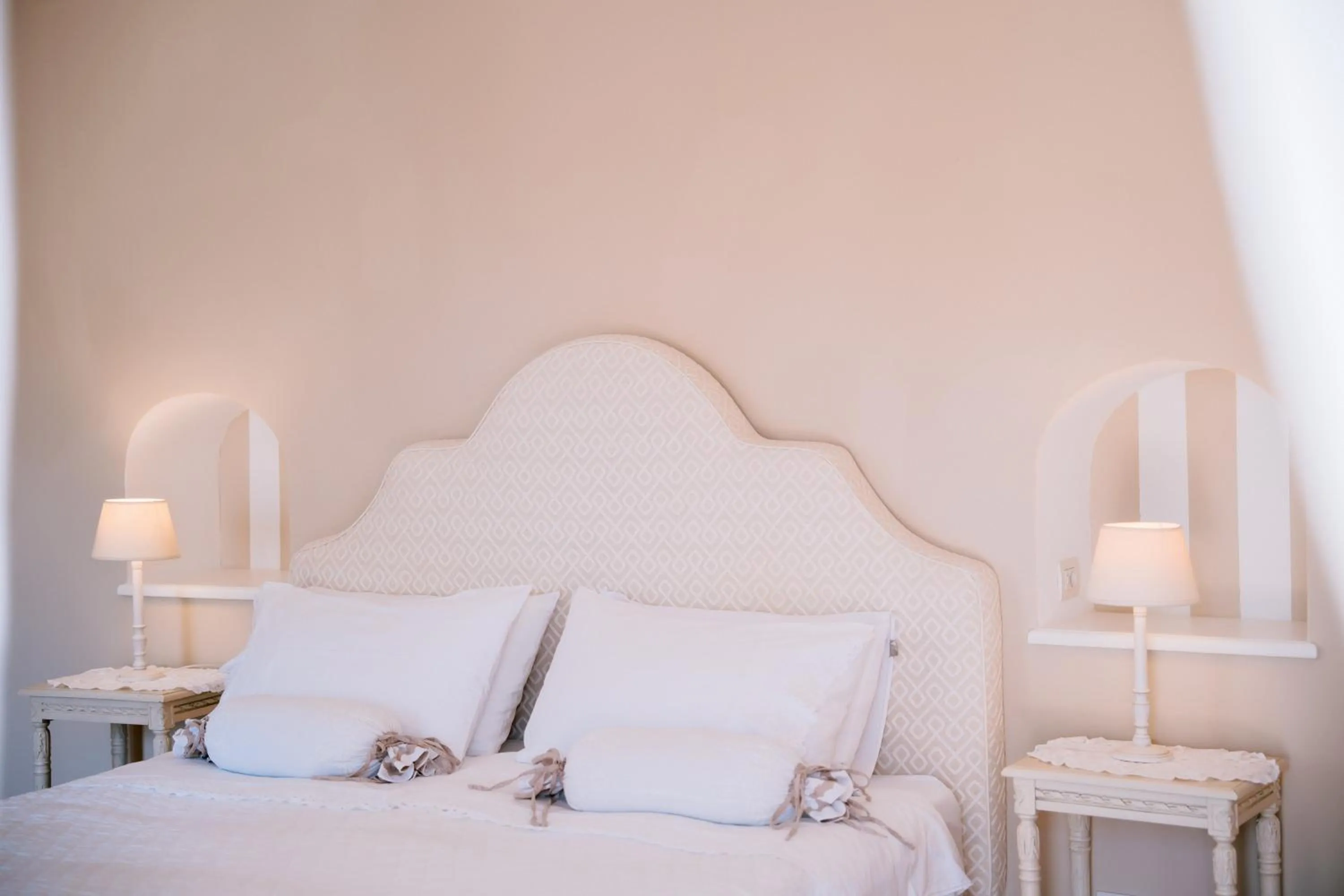 Bed in Villa Mary Suites