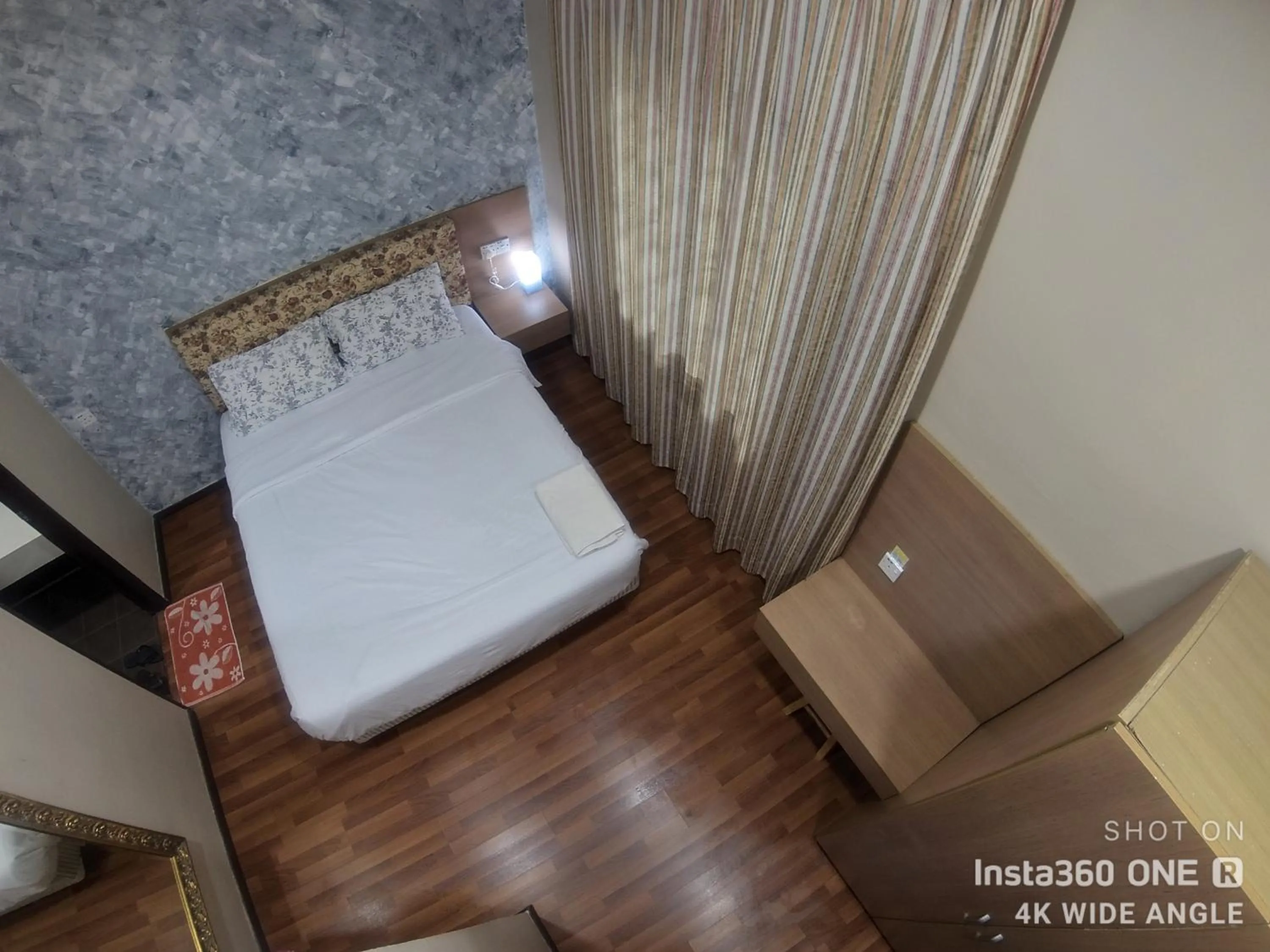 Bed in EagleNest at Iris House Resort