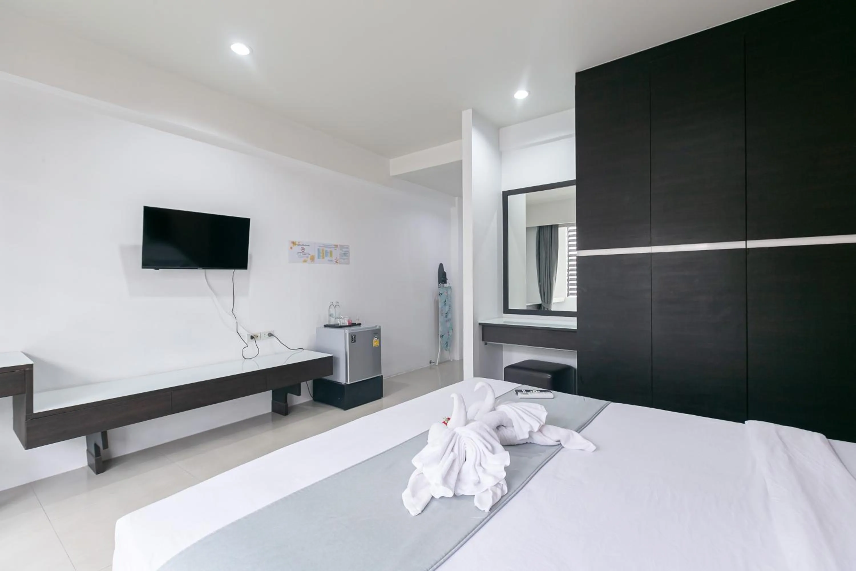 Bed in Ruan Plaisoi Apartment