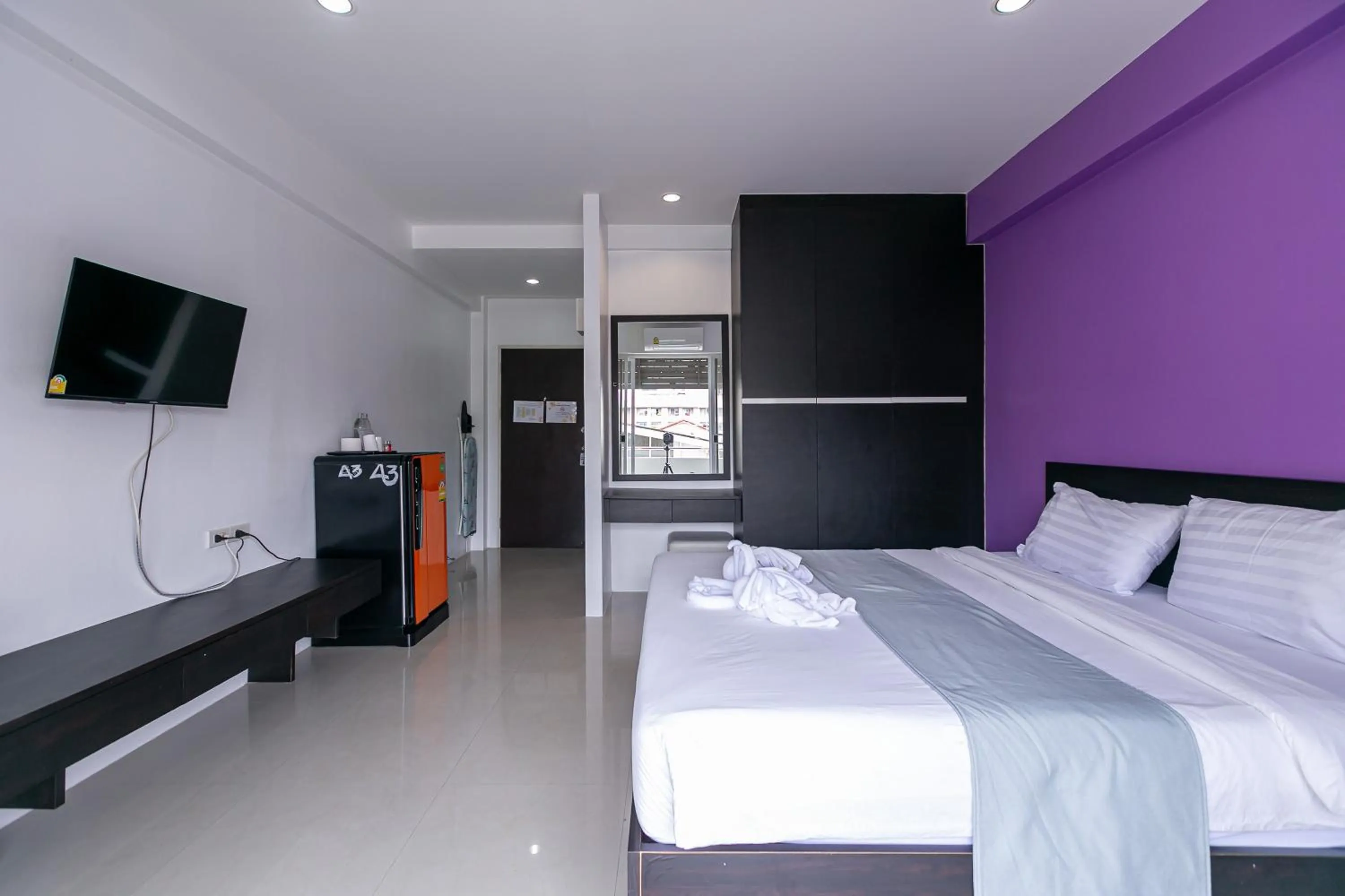 Bed in Ruan Plaisoi Apartment