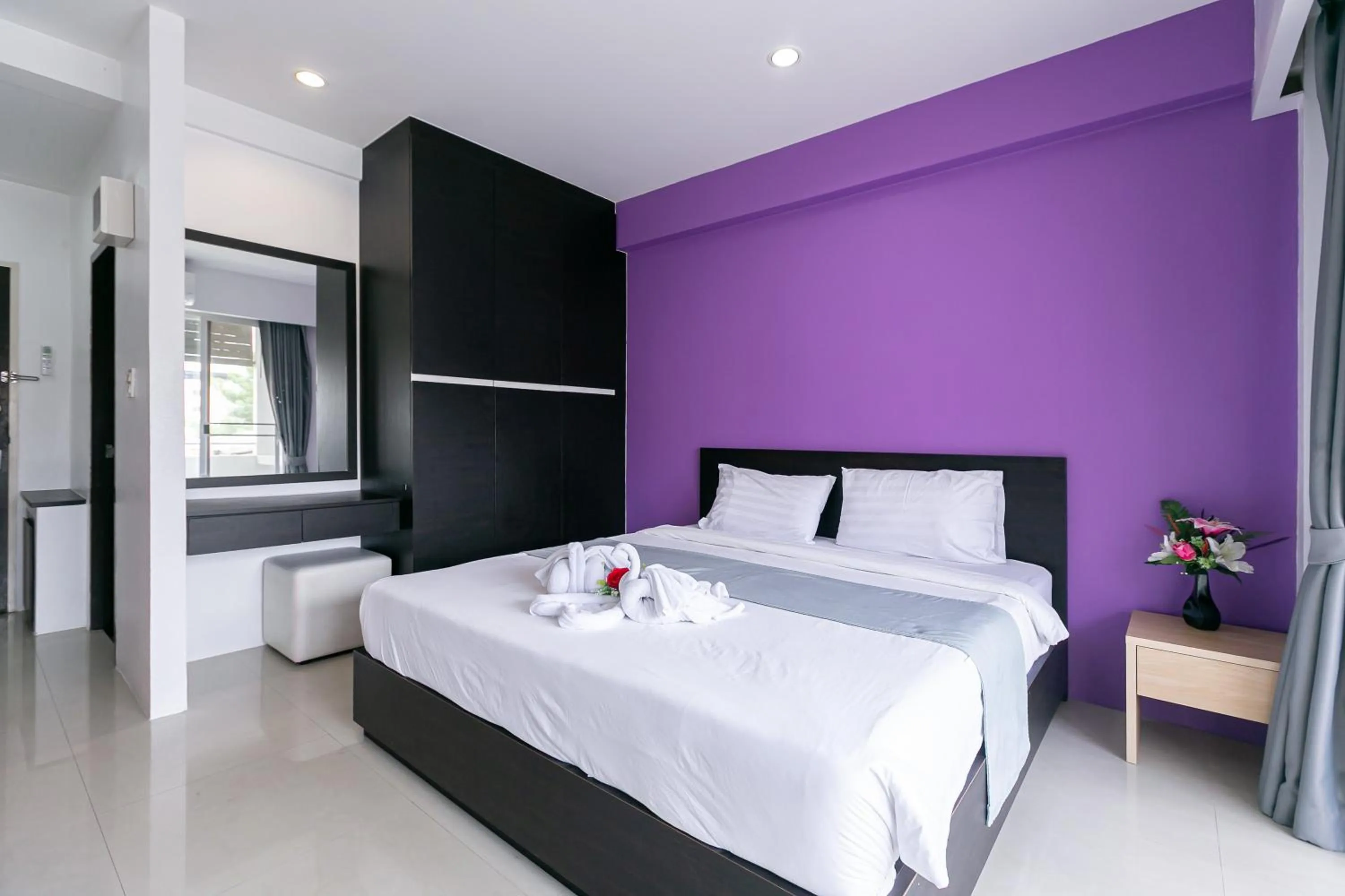 Bed in Ruan Plaisoi Apartment