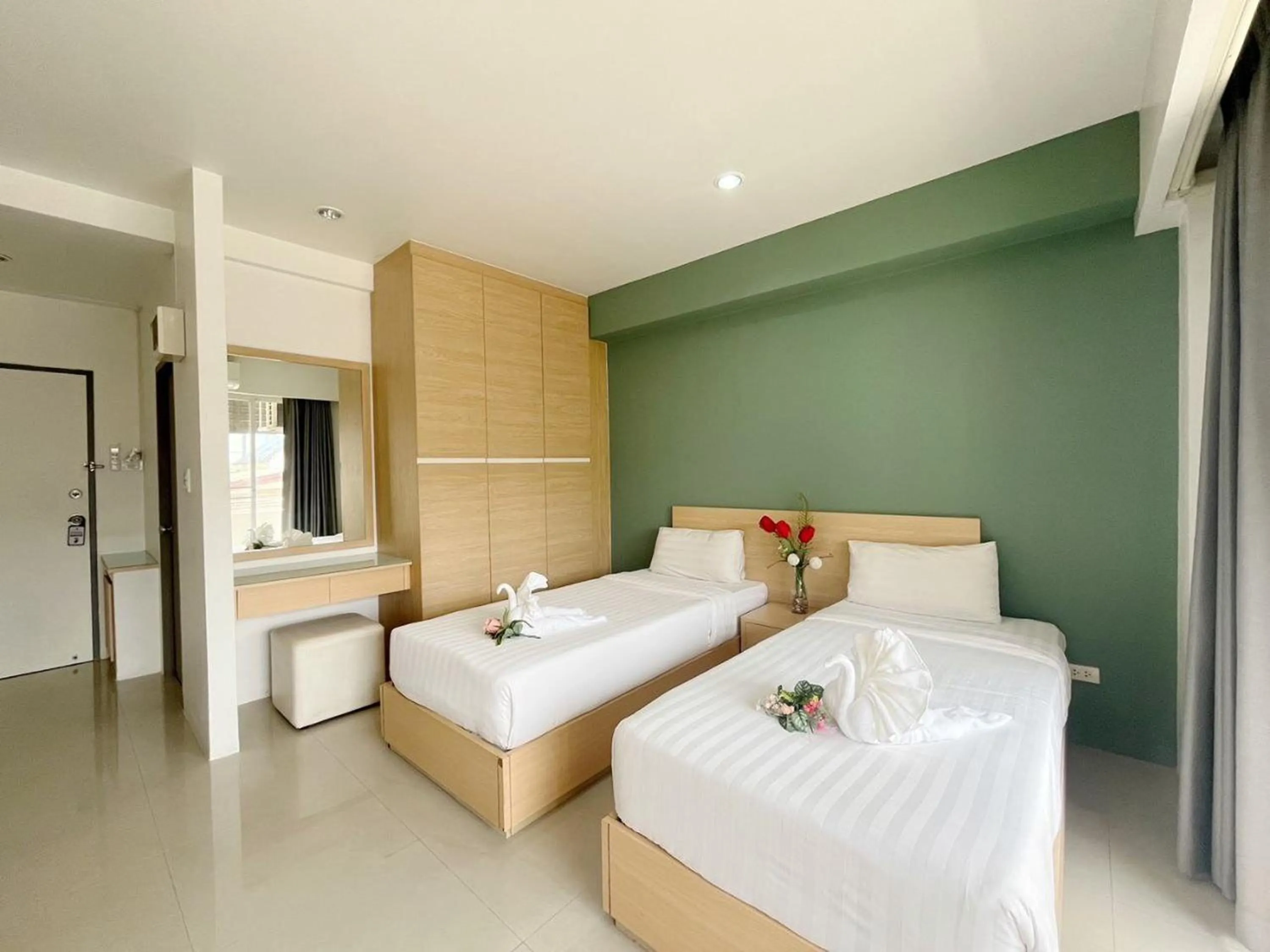 Bed in Ruan Plaisoi Apartment