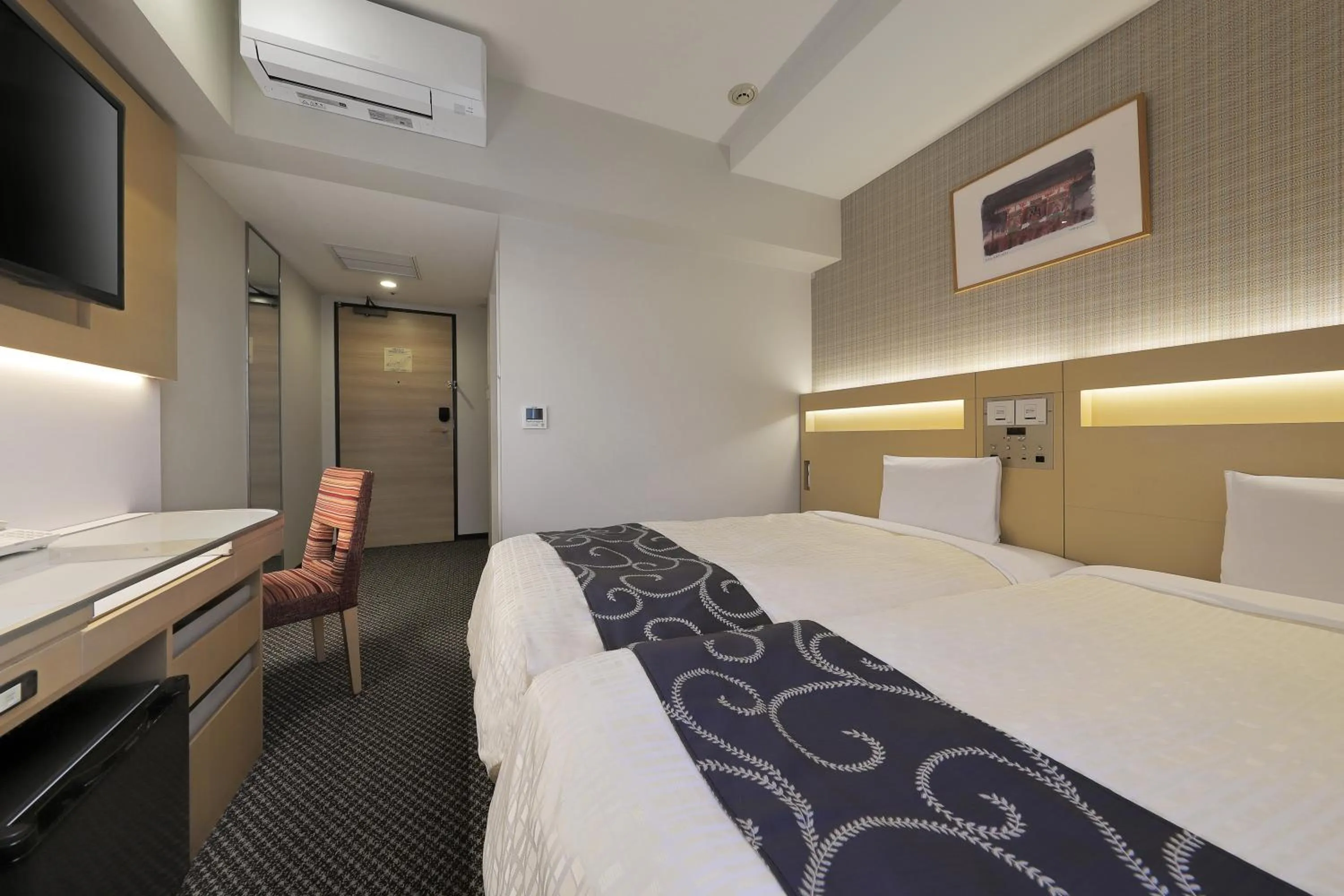 Bed in Keio Presso Inn Nihonbashi Kayabacho