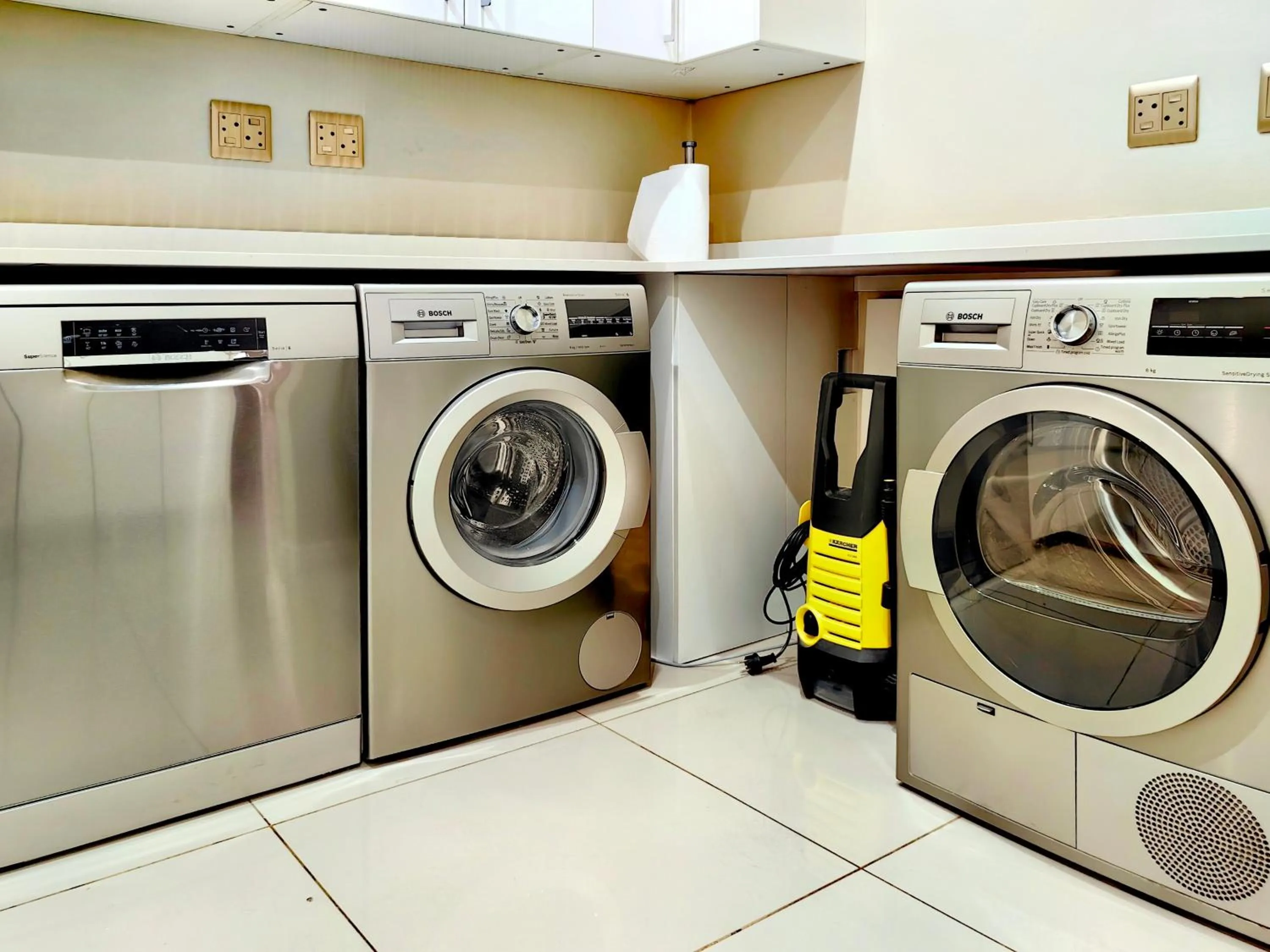 washing machine in 4 on Pritchard Luxury Suites