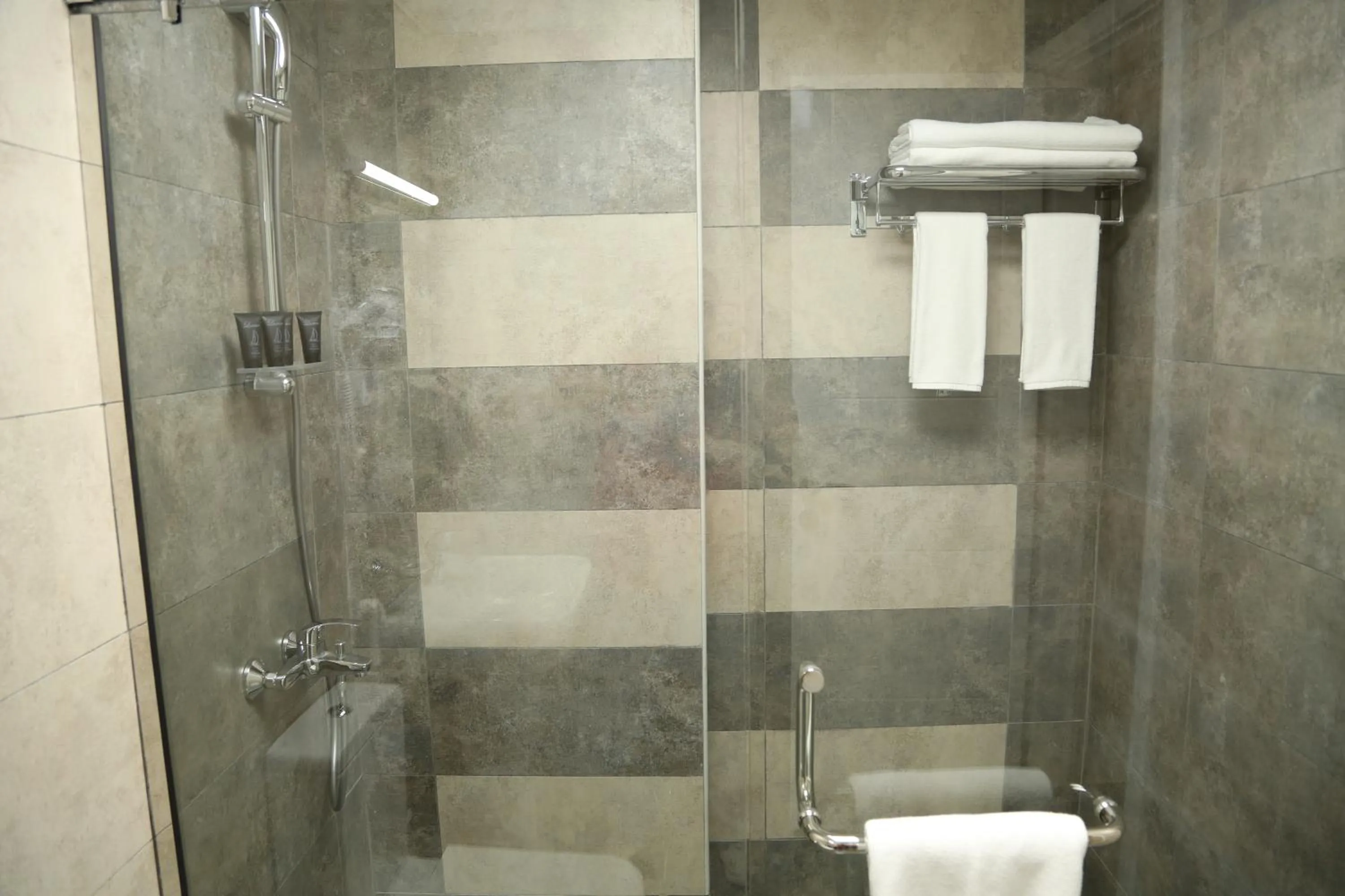 Shower in Uptown Hotel Apartment Fujairah By Gewan