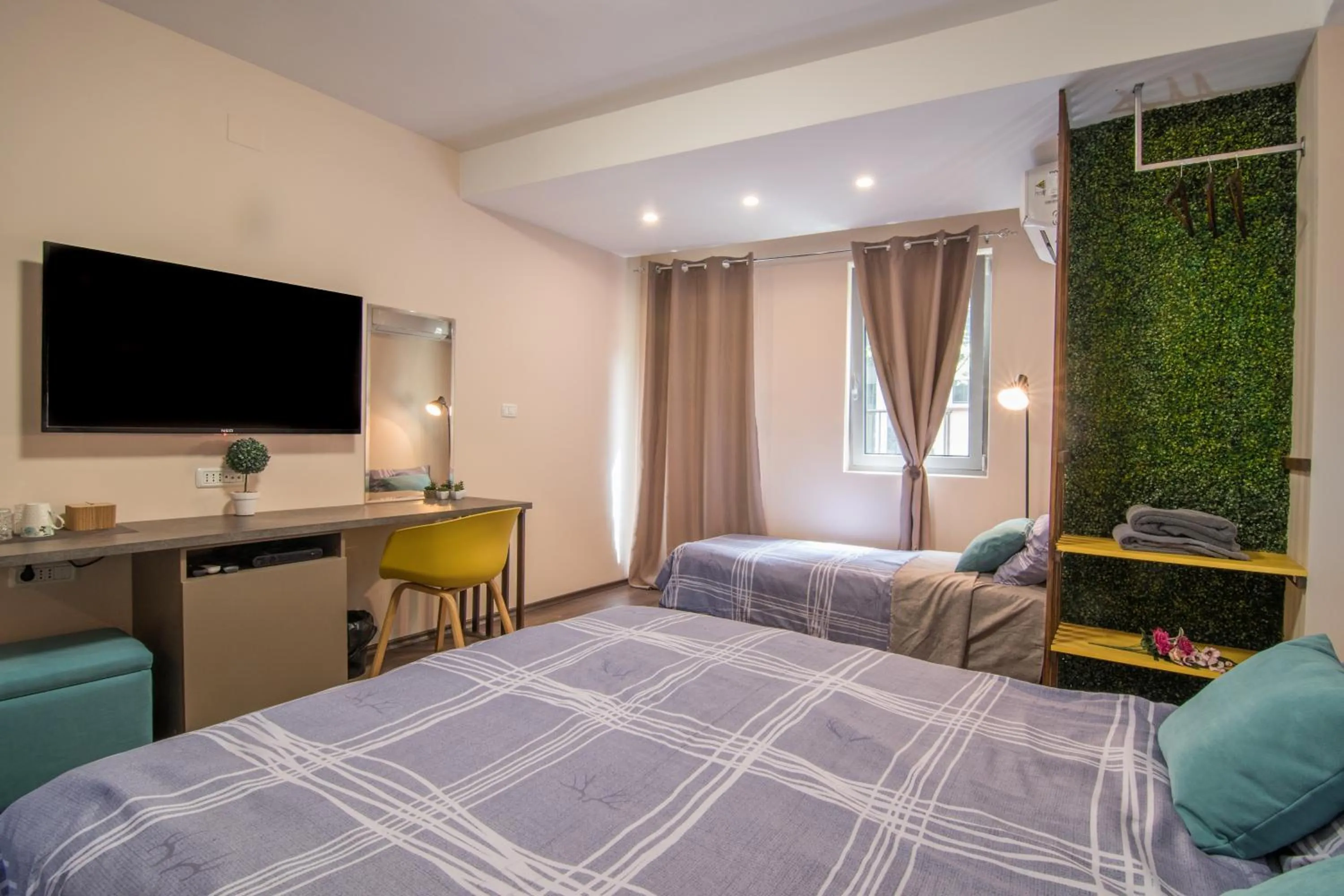 Communal lounge/ TV room, Bed in Vanilla Boutique Hotel