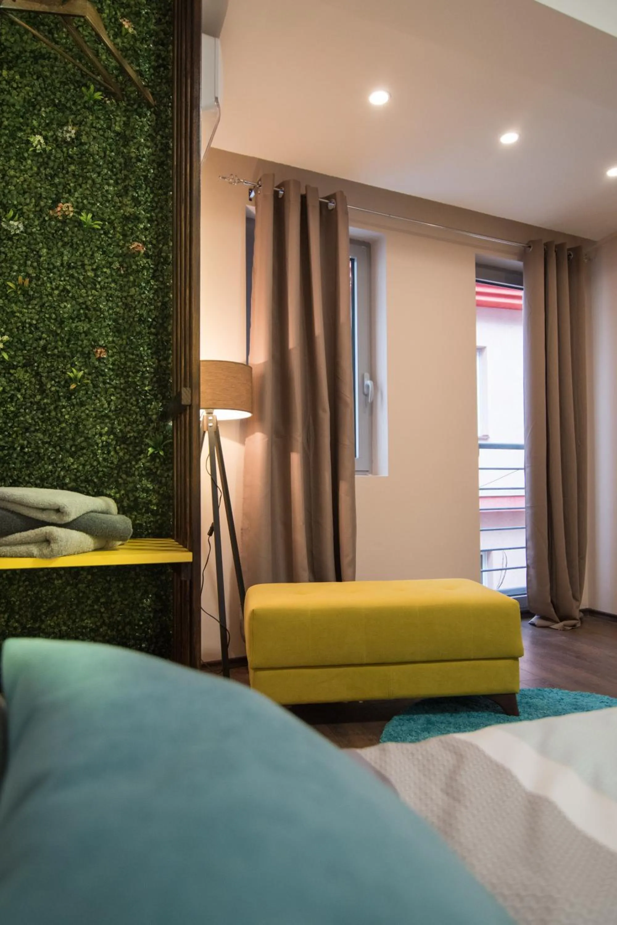 Seating area, Bed in Vanilla Boutique Hotel