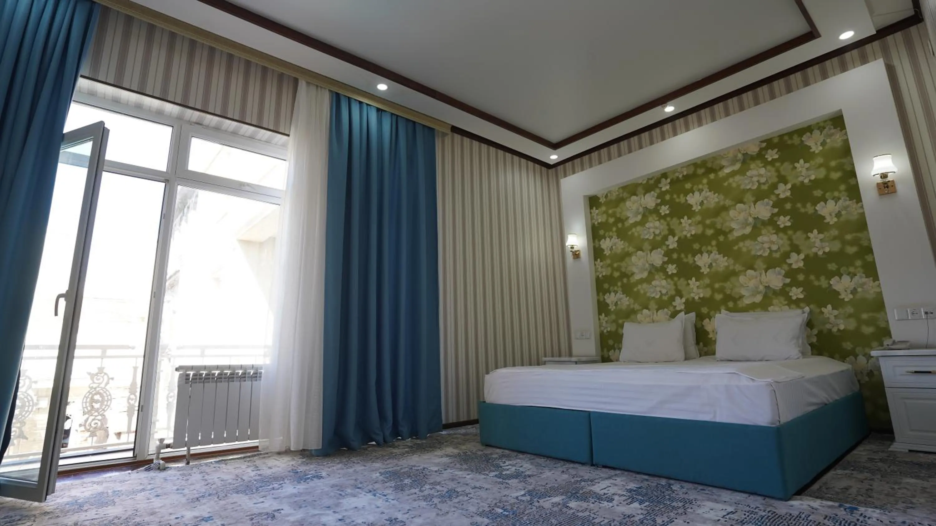 Bed in Hotel Khiva Palace