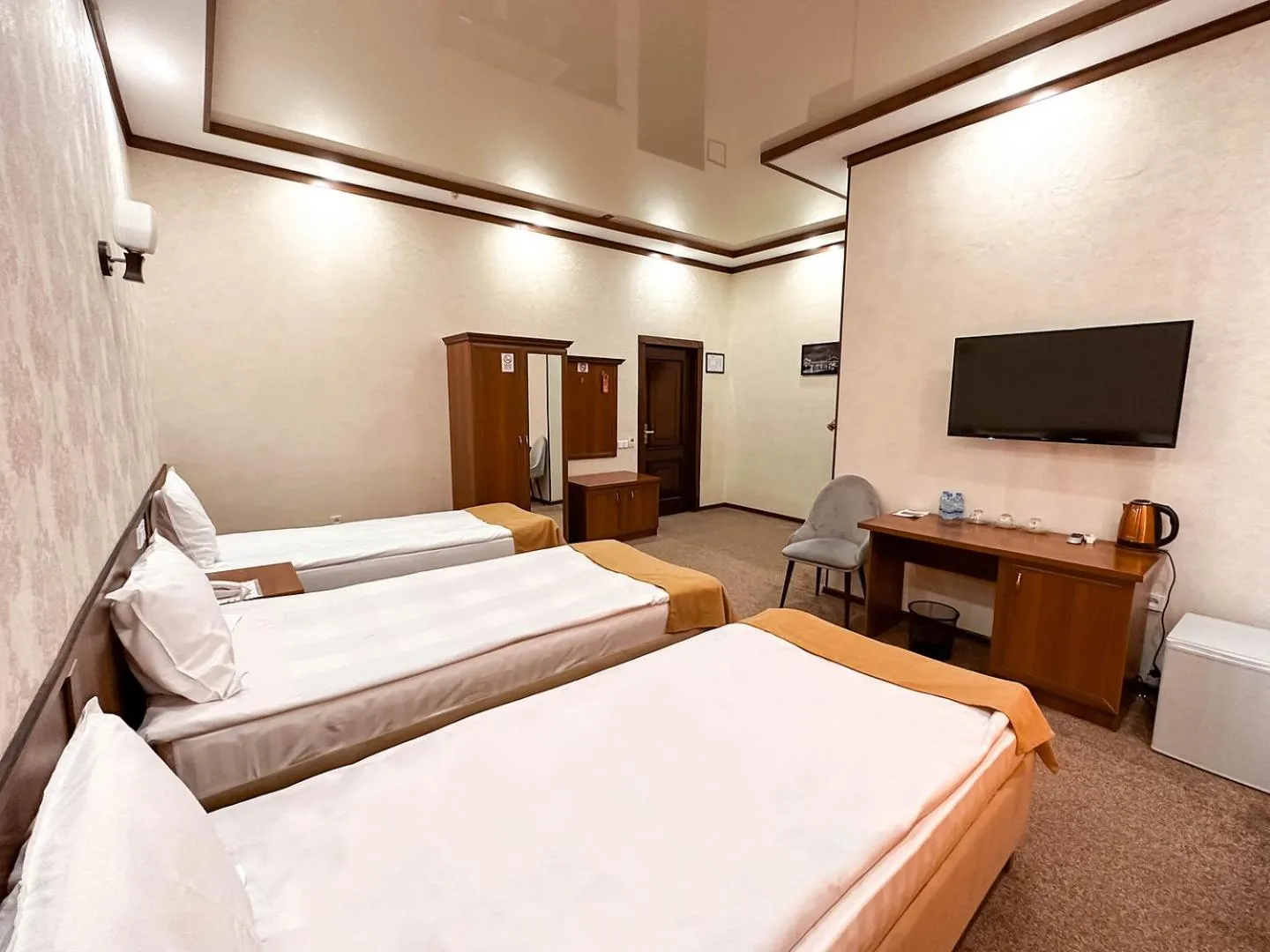 Bed in Hotel Khiva Palace