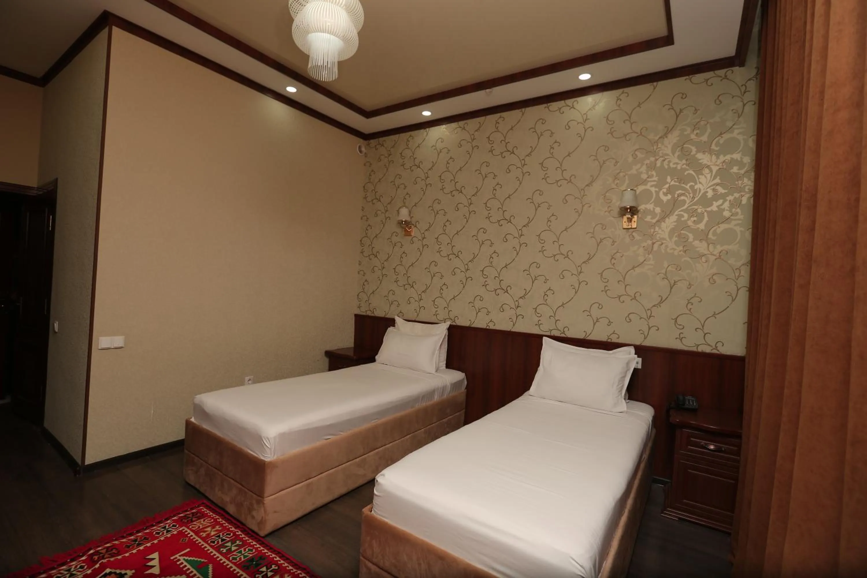 Bed in Hotel Khiva Palace