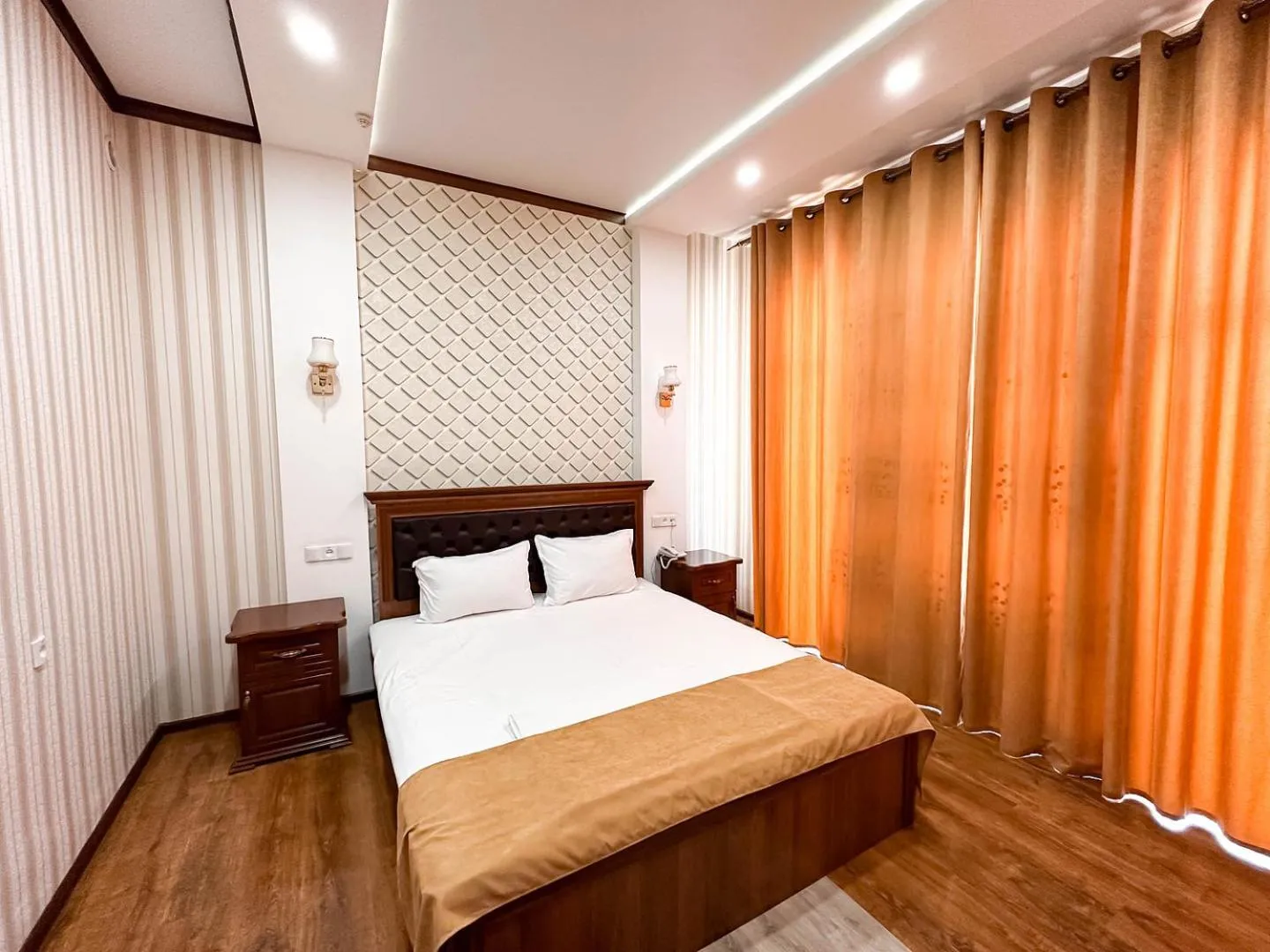 Bed in Hotel Khiva Palace