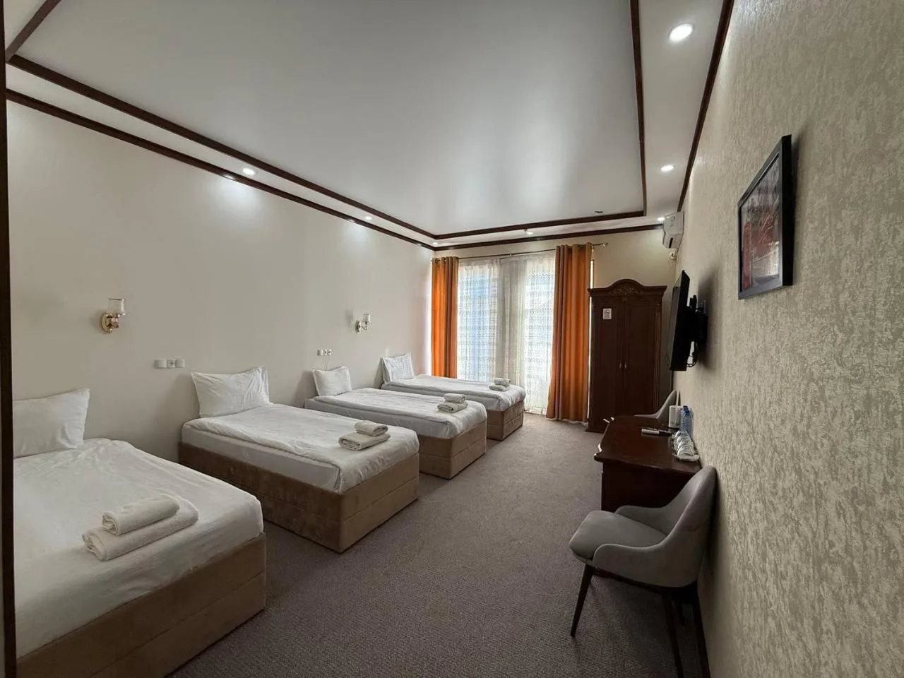 Bed in Hotel Khiva Palace