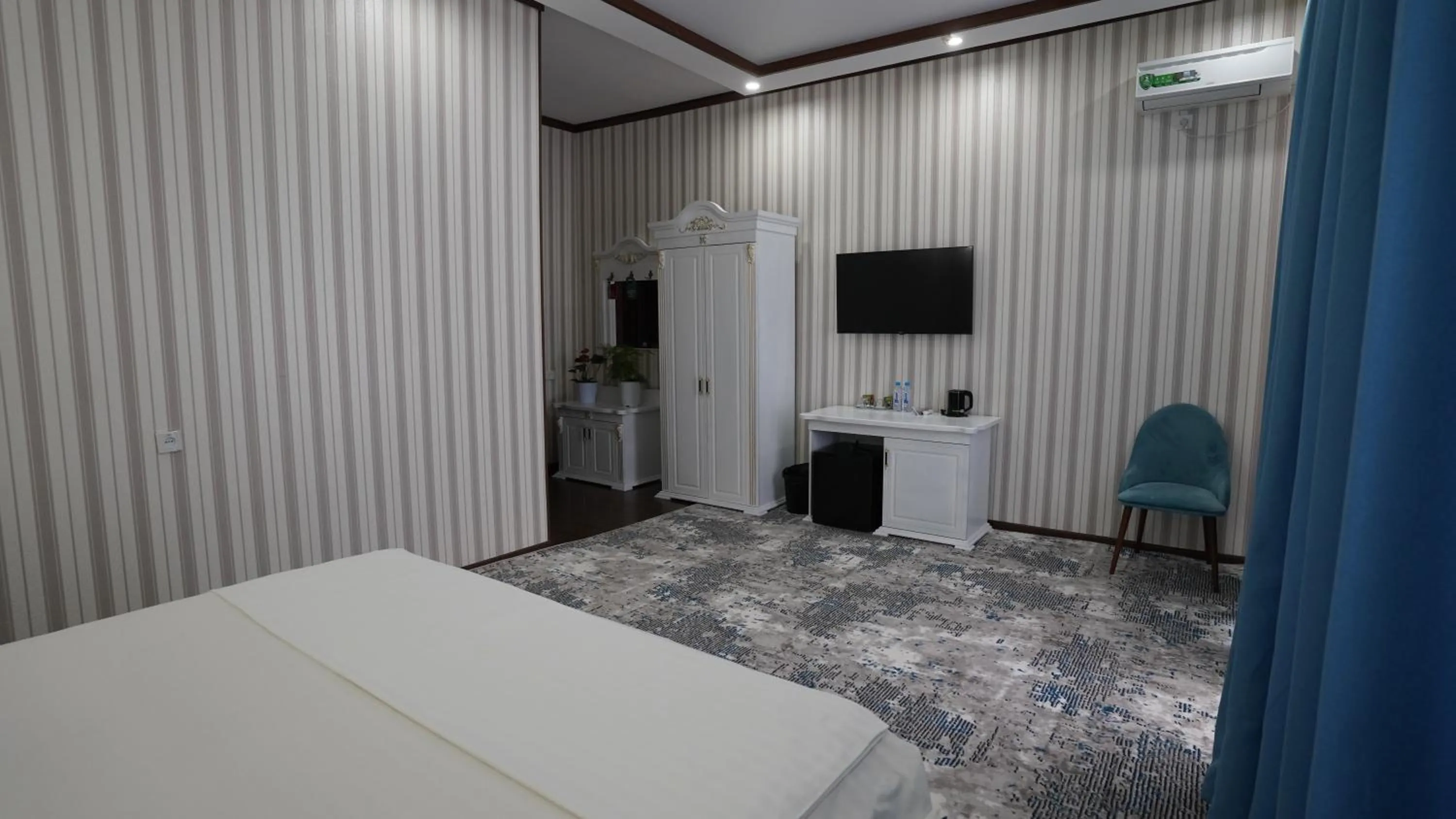 Bed in Hotel Khiva Palace