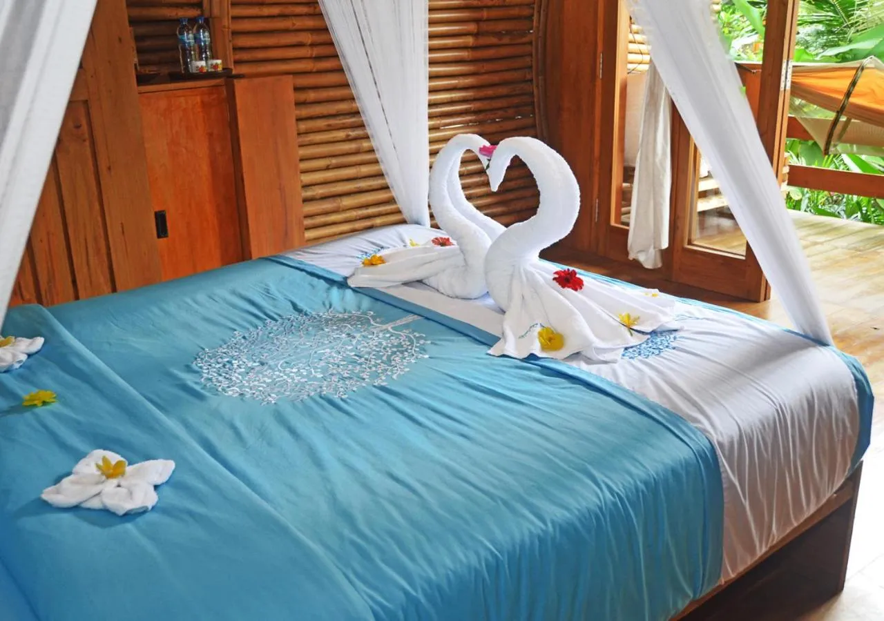 Bedroom, Bed in Lagoona Beach Bungalows - Eco Bungalows Batukaras