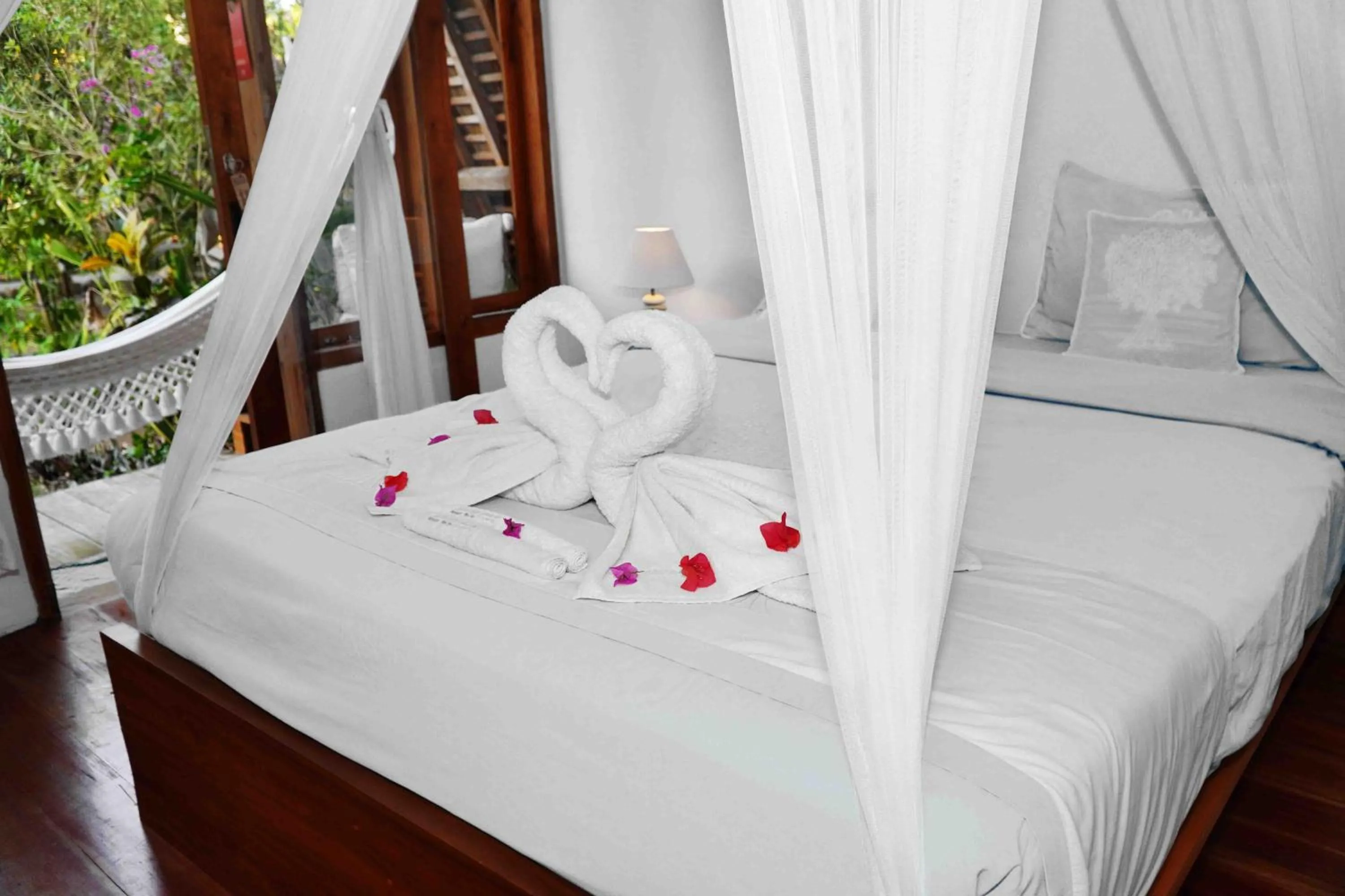 Bed in Lagoona Beach Bungalows - Eco Bungalows Batukaras