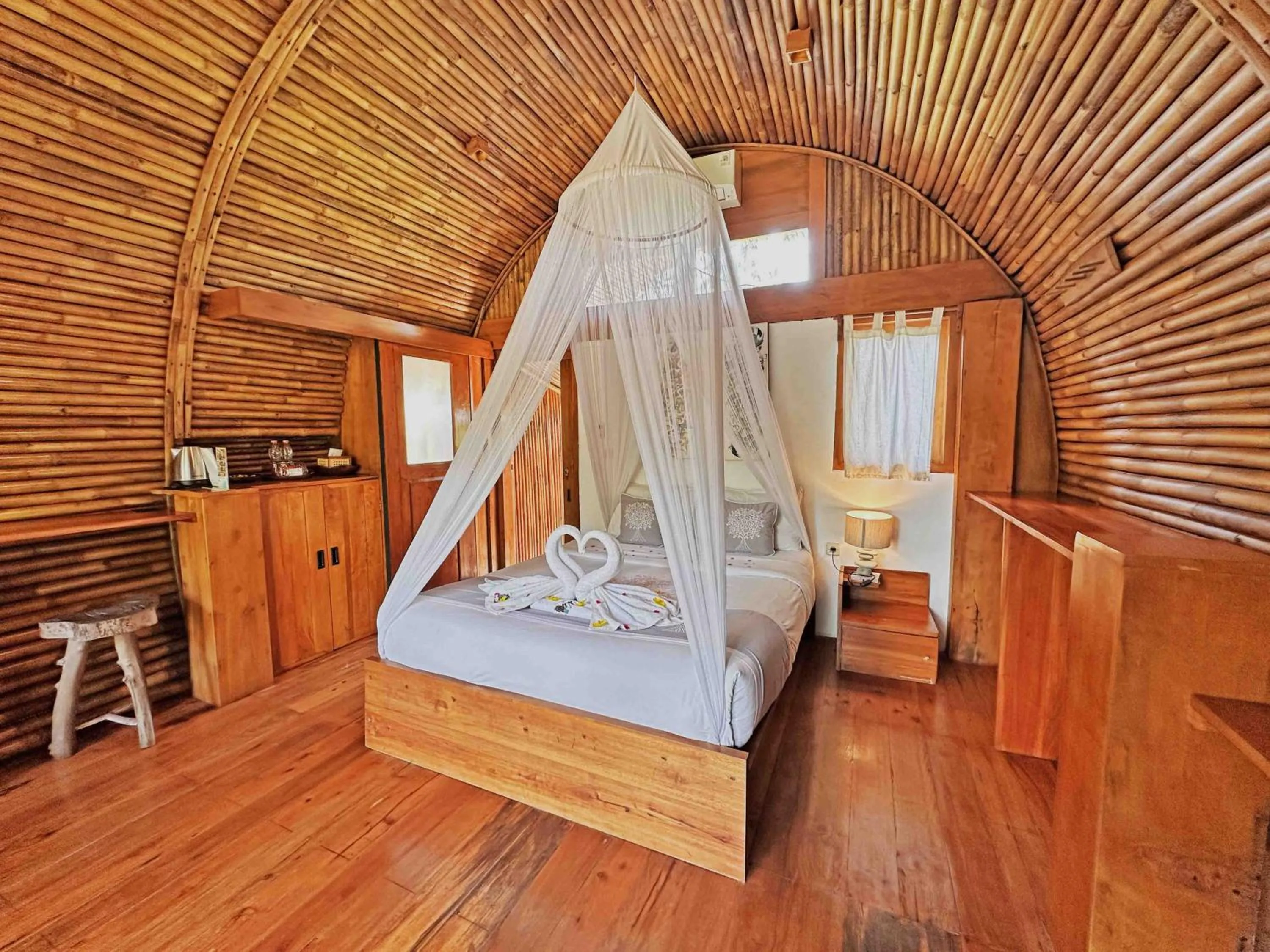 Photo of the whole room, Bed in Lagoona Beach Bungalows - Eco Bungalows Batukaras